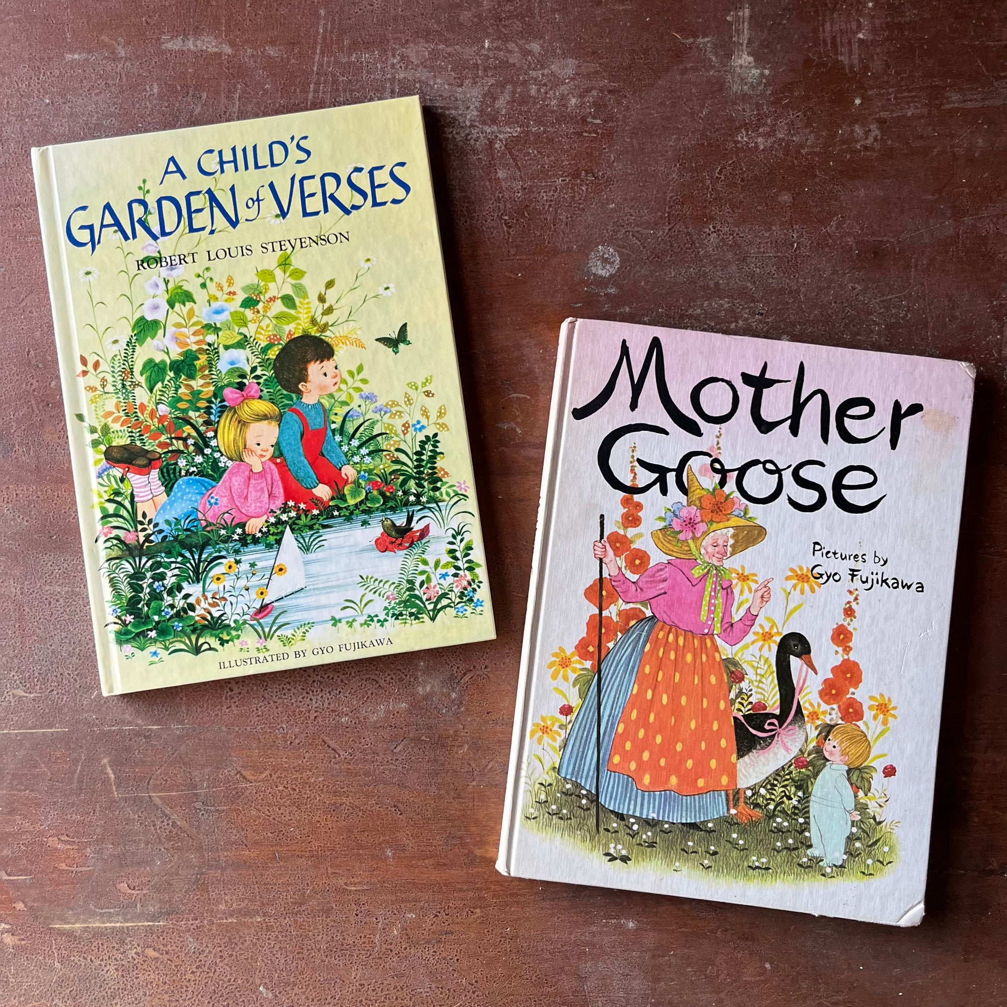 A Child's Garden of Verses written by Robert Louis Stevenson & Mother Goose Nursery Rhymes-both illustrated by Gyo Fujikawa-vintage children's books-view of the front covers with illustrations by Gyo Fujikawa on each