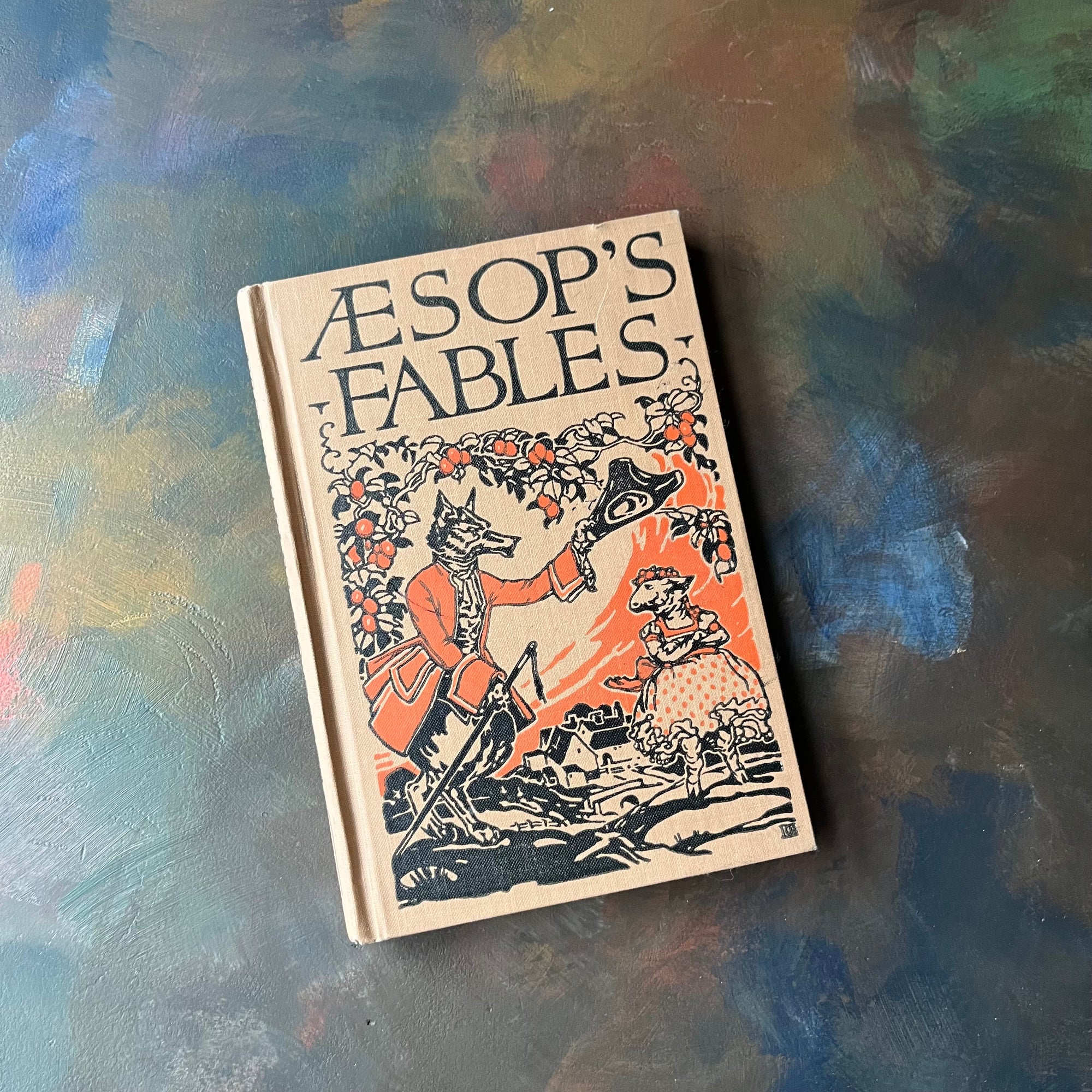 Aesop's Fables-1928 The John C. Winston Company Edition-vintage fairy tales & folk lore-view of the front cover with an illustration of a fox greeting a sheep in orange & black