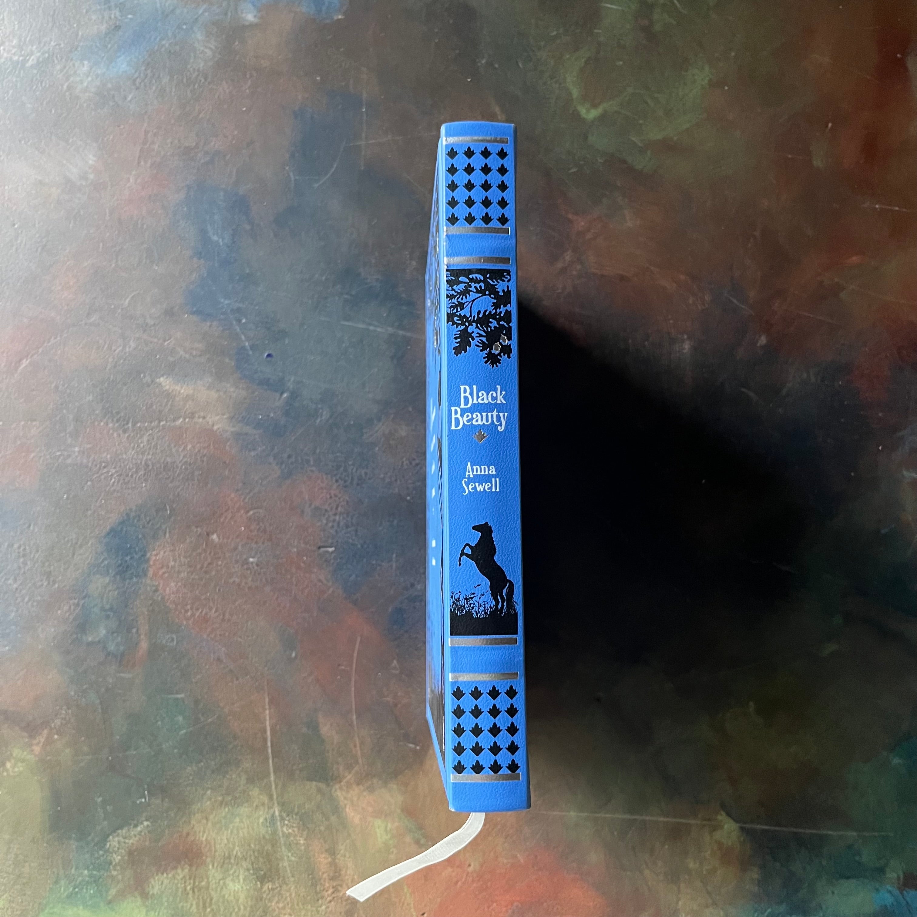 Black Beauty written by Anna Sewell with illustrations by Lucy Kemp-Welch-Barnes & Noble Leatherbound Edition-classic literature for children-vintage children's chapter book-view of the spine