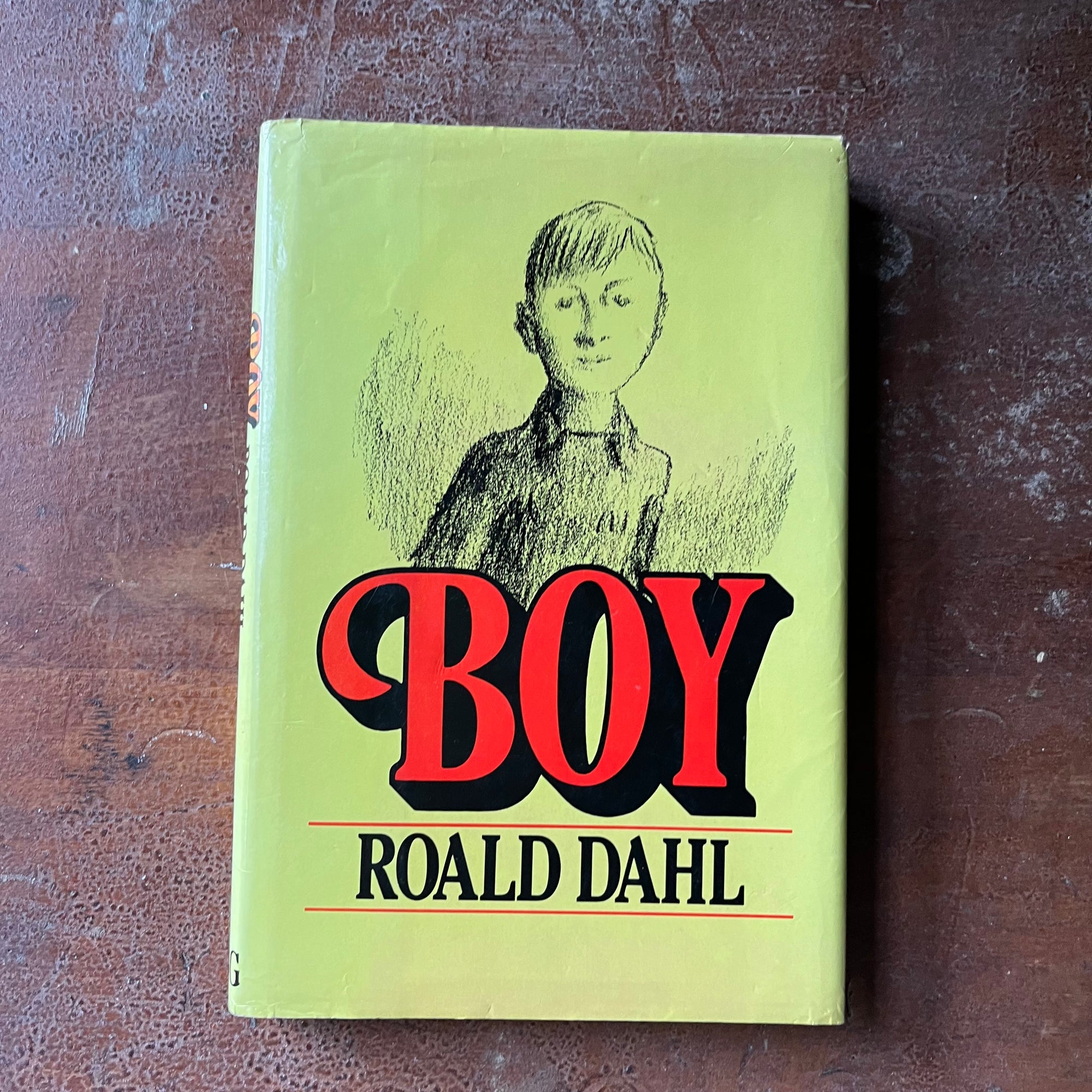vintage children's book, vintage biography, hardcover book with original dust jacket - Boy written by Roald Dahl - view of the dust jacket's front cover with an illustration of a young boy