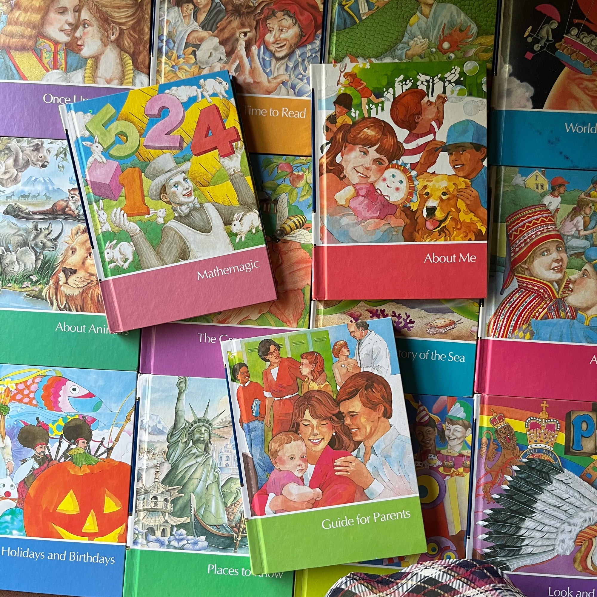 vintage children's book set, Childcraft How & Why Library 15 Volume Complete Set published by Wonder Books, Inc. - view of the front covers