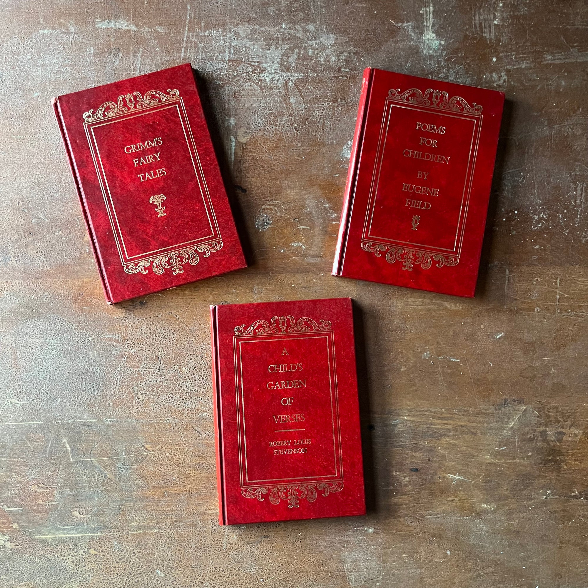 Collection of Avenel Books Editions-A Child's Garden of Verses, Poems for Children by Eugene Fields, and Grimm's Fairy Tales-vintage children's books-view of the embossed front covers in red & gold