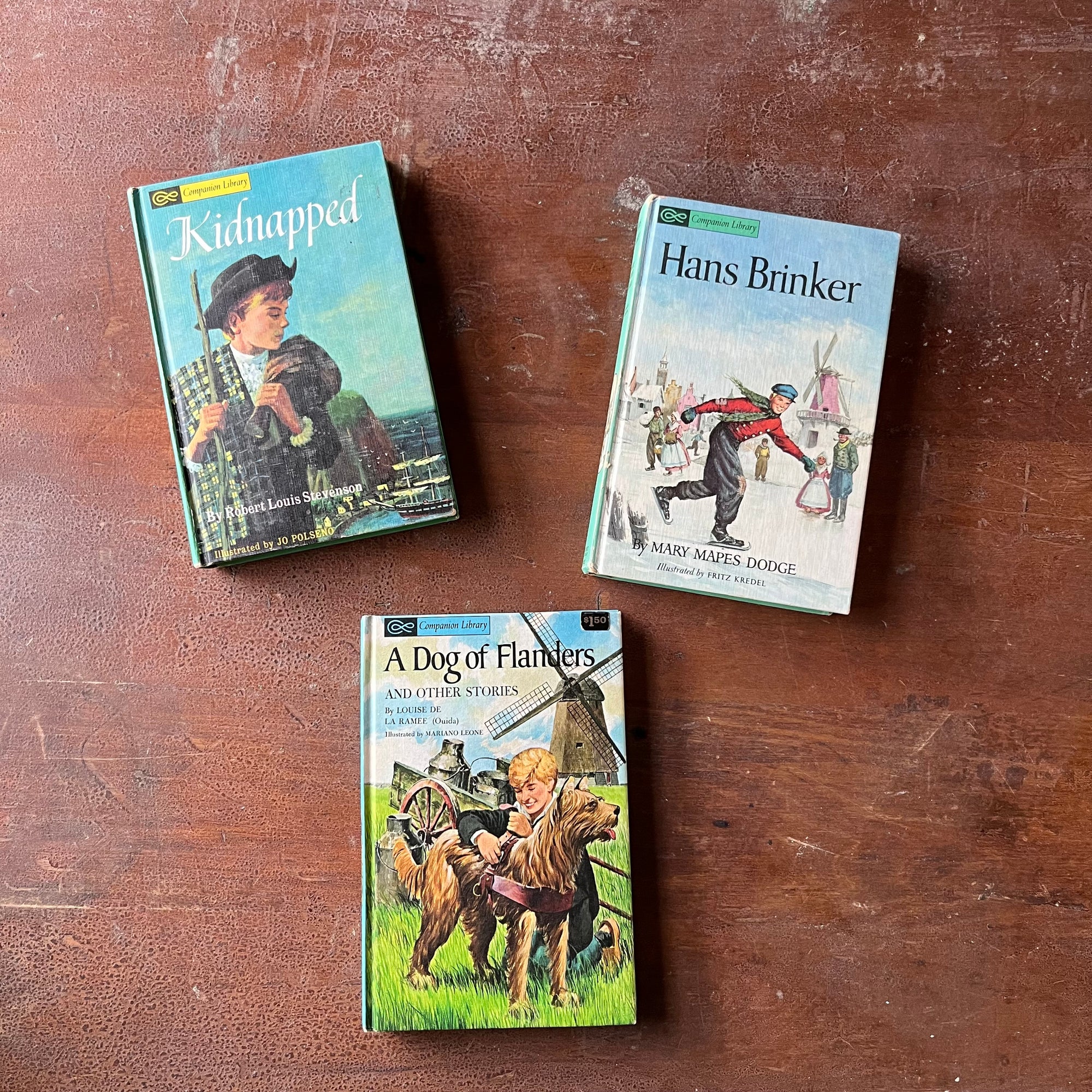 Companion Library Book Set-Kidnapped, Hans Brinker & A Dog of Flanders-vintage children's chapter books-view of the colorful front covers with illustrations from each book