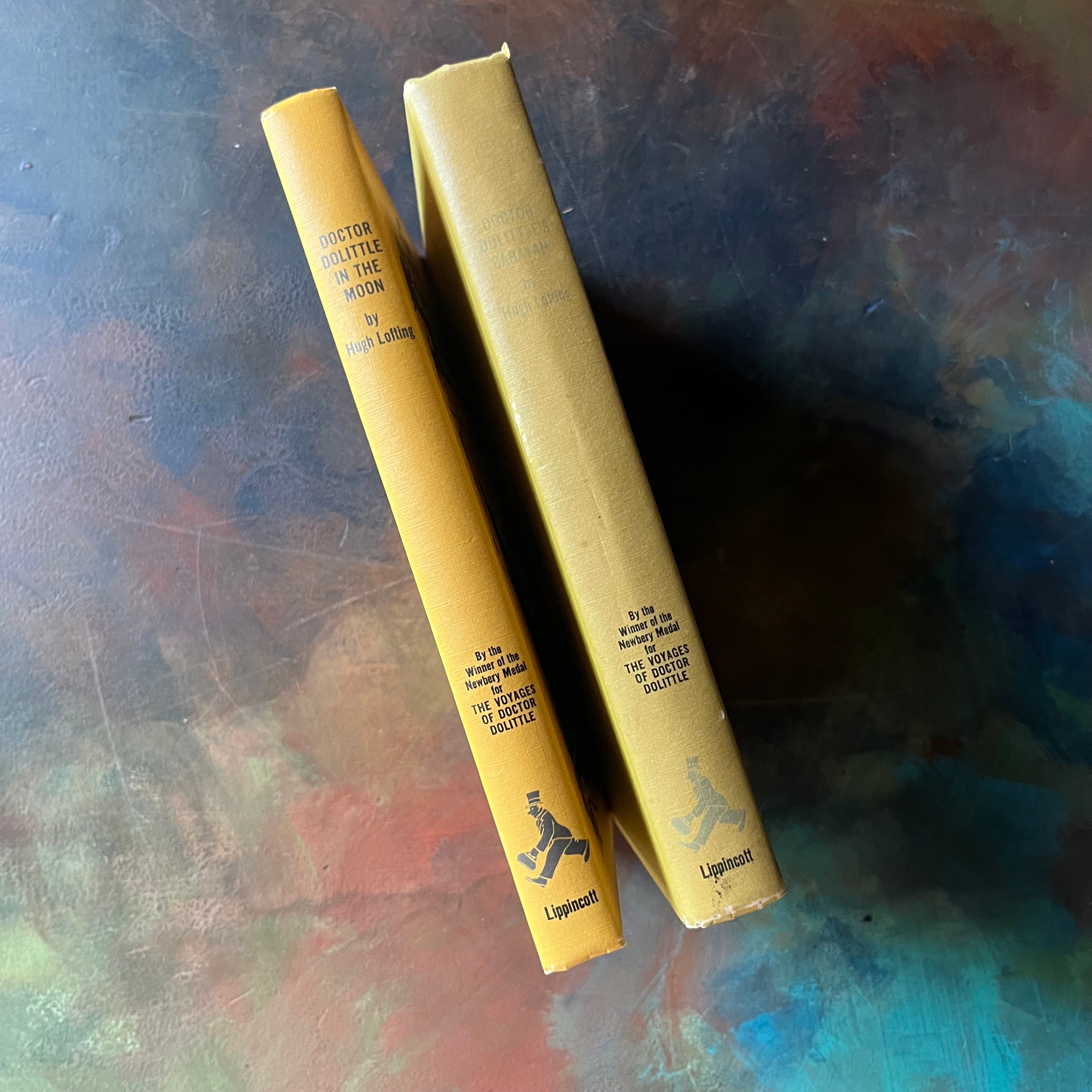 Doctor Dolittle's Caravan and Doctor Dolittle in the Moon written & illustrated by Hugh Lofting-vintage children's books to read a-loud-view of the spines