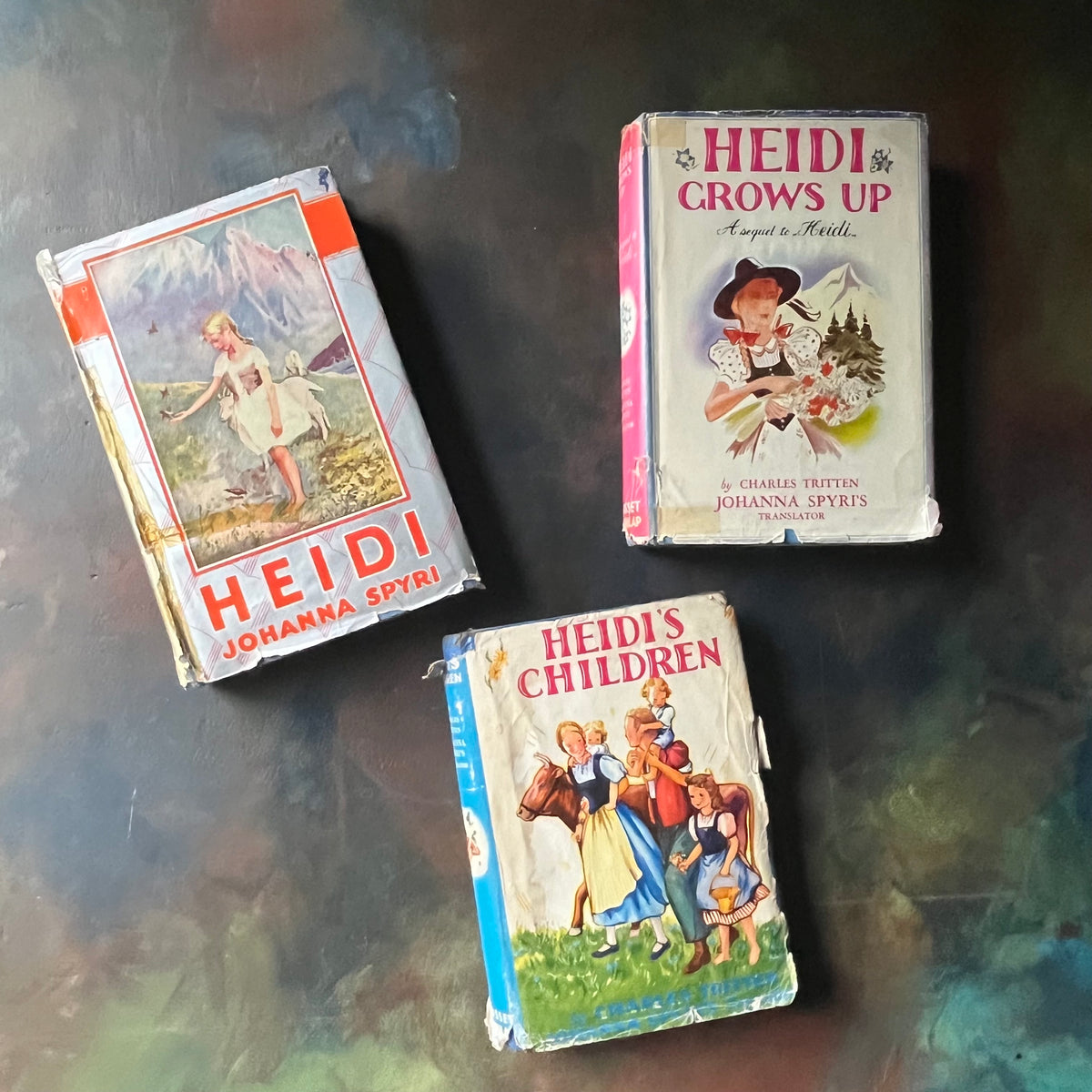 Heidi, Heidi Grows Up, and Heidi's Children by Johanna Spyri and Charles Tritten-classic children's literature-vintage chapter books for kids-view of the dust jacket's front covers