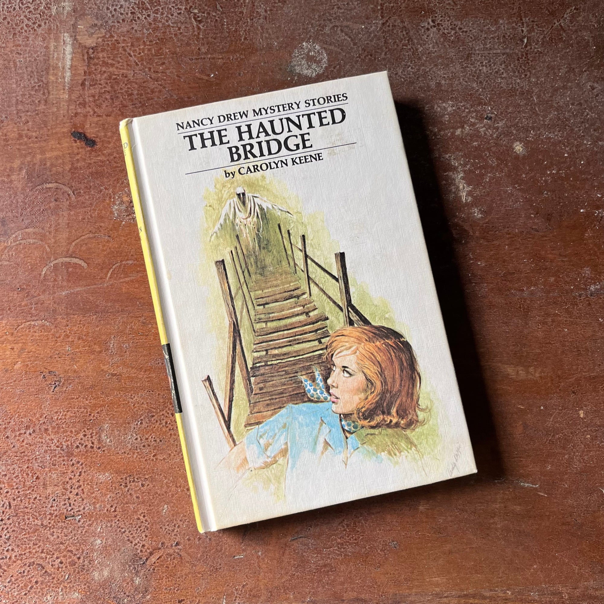 vintage children's chapter book, adventure book for girls, Nancy Drew Mystery Stories - #15 The Haunted Bridge written by Carolyn Keene - front cover