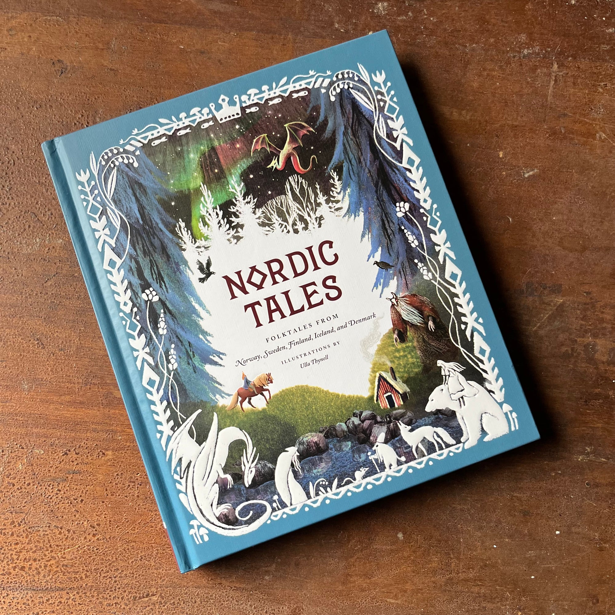 children's stories, folktales, fairy tales, stories of other lands - Nordic Tales Folktales From Norway, Sweden, Finland, Iceland and Denmark with illustrations by Ulla Thynell - view of the embossed front cover
