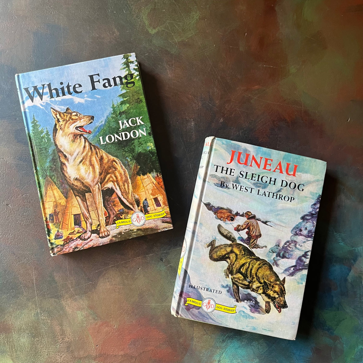 Pair of Famous Grosset and Dunlap Dog Stories-White Fang by Jack London-Juneau The Sled Dog by West Lathrop-classic children's literature-vintage dog books-view of the front covers