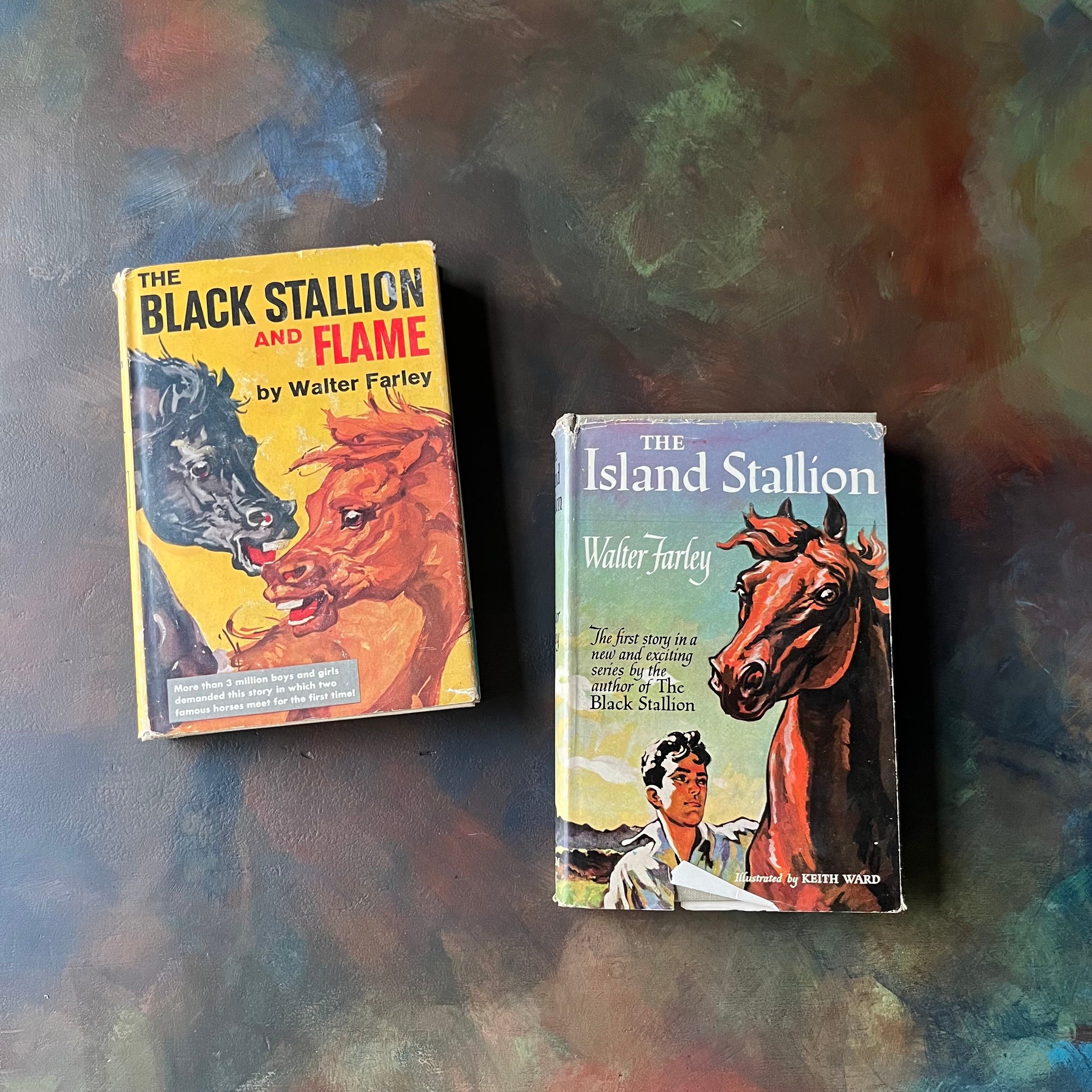 Set of Three Dick Druna Books-Dick Druna's Cinderella, Dick Druna's Tom Thumb & Dick Druna's Little Red Riding Hood-vintage fairy tales-view of the dust jacket's front covers - books are sitting on a table I painted to look like an art palette