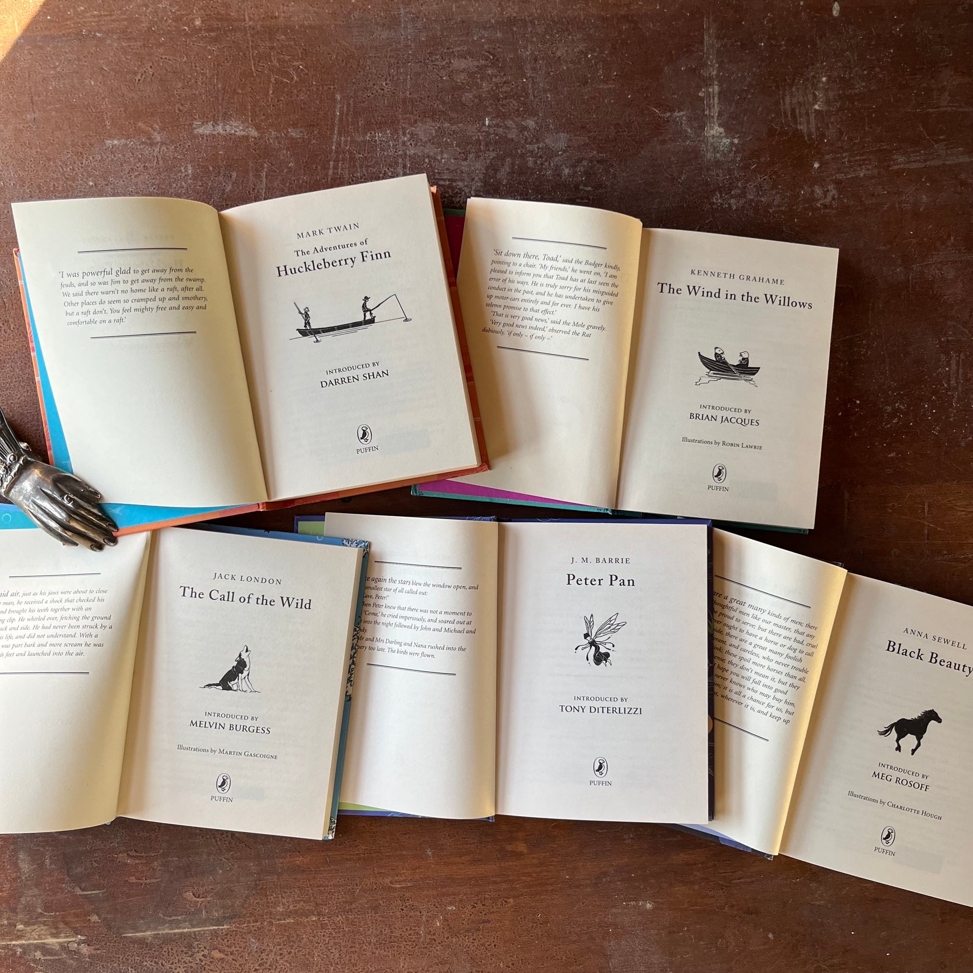 Puffin Children's Classics Book Set-5 Titles-The Adventures of Huckleberry Finn, The Wind in the Willows, The Call of the Wild, Black Beauty & Peter Pan-view of the title pages