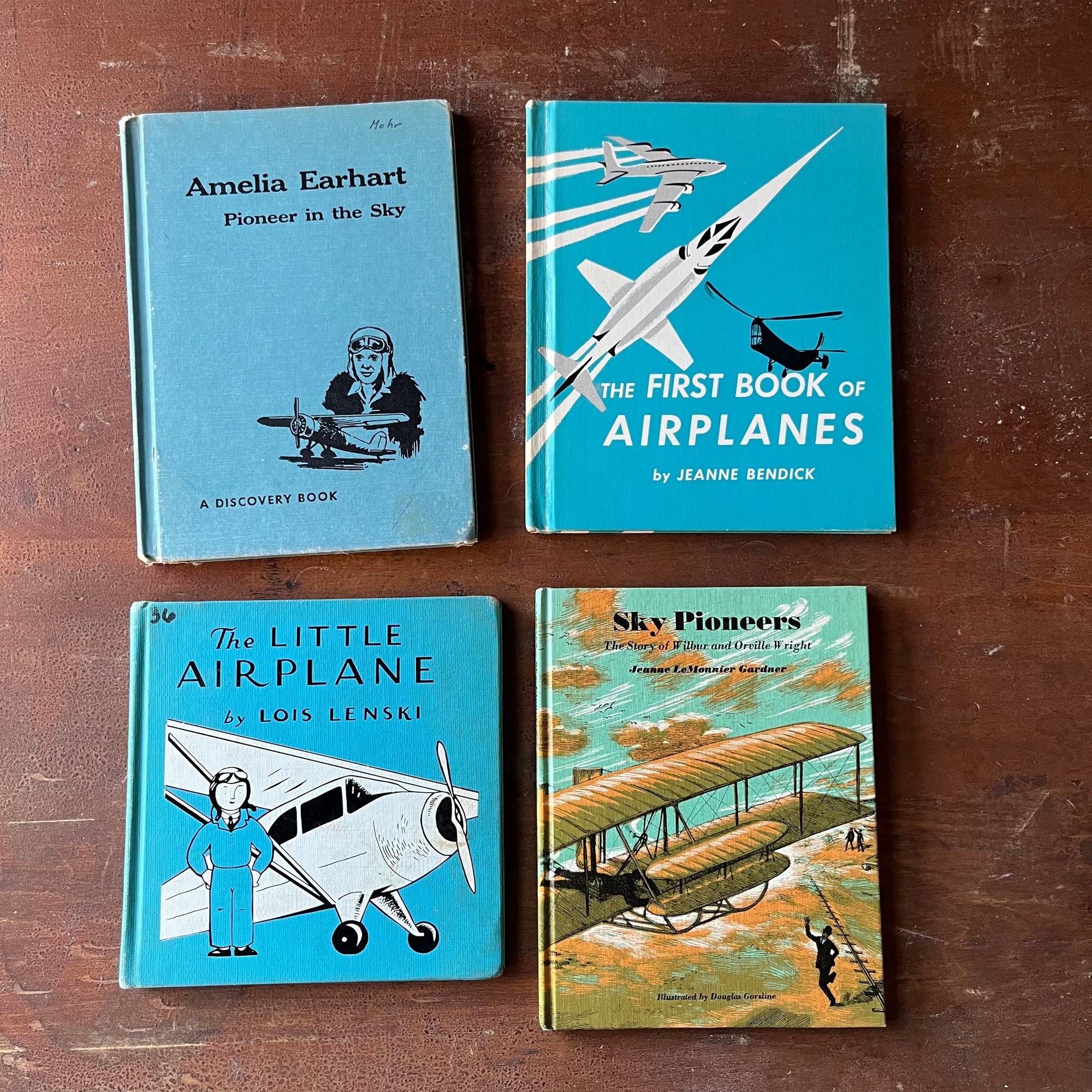 Set of Four Beginner Reader & Picture Books About Airplanes-The Little Airplane by Lois Lenski, Amelia Earhart Pioneer of the Sky, Sky Pioneers The Story of Wilbur & Orville Wright, & The First Book of Airplanes-view of the front covers