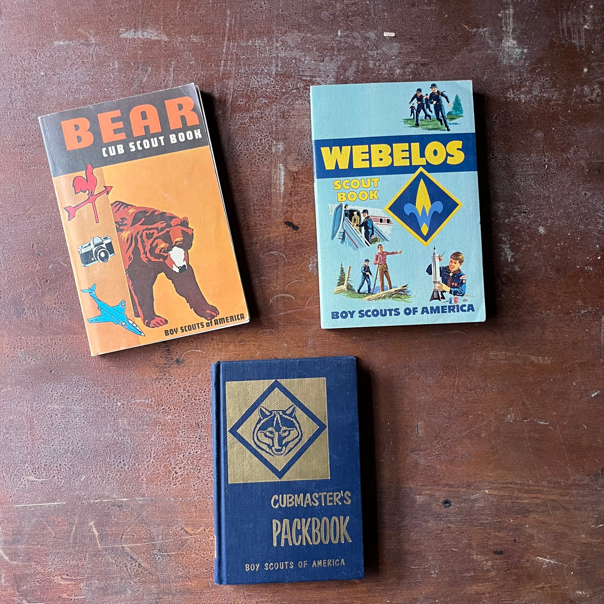 Set of Three Vintage Cub & Boy Scout Books - Webelos Scout Book, Cubmaster's Packbook & Bear Cub Scout Book - view of the front covers
