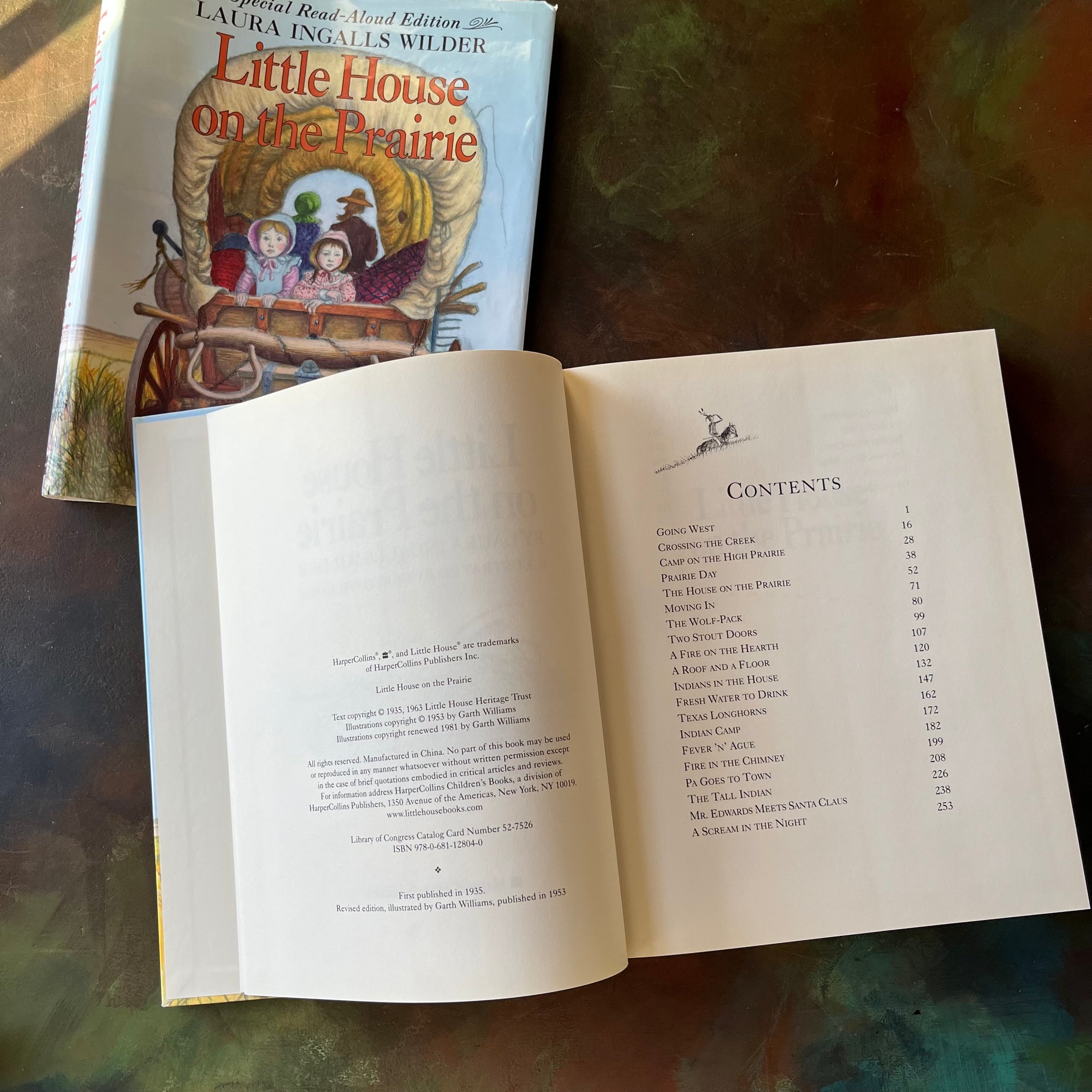 Special Read-Aloud Edition of Little House on the Prairie written by Laura Ingalls Wilder with illustrations by Garth Williams-Newbery Honor Book-vintage children's chapter book-living book-view of the copyright & contents pages