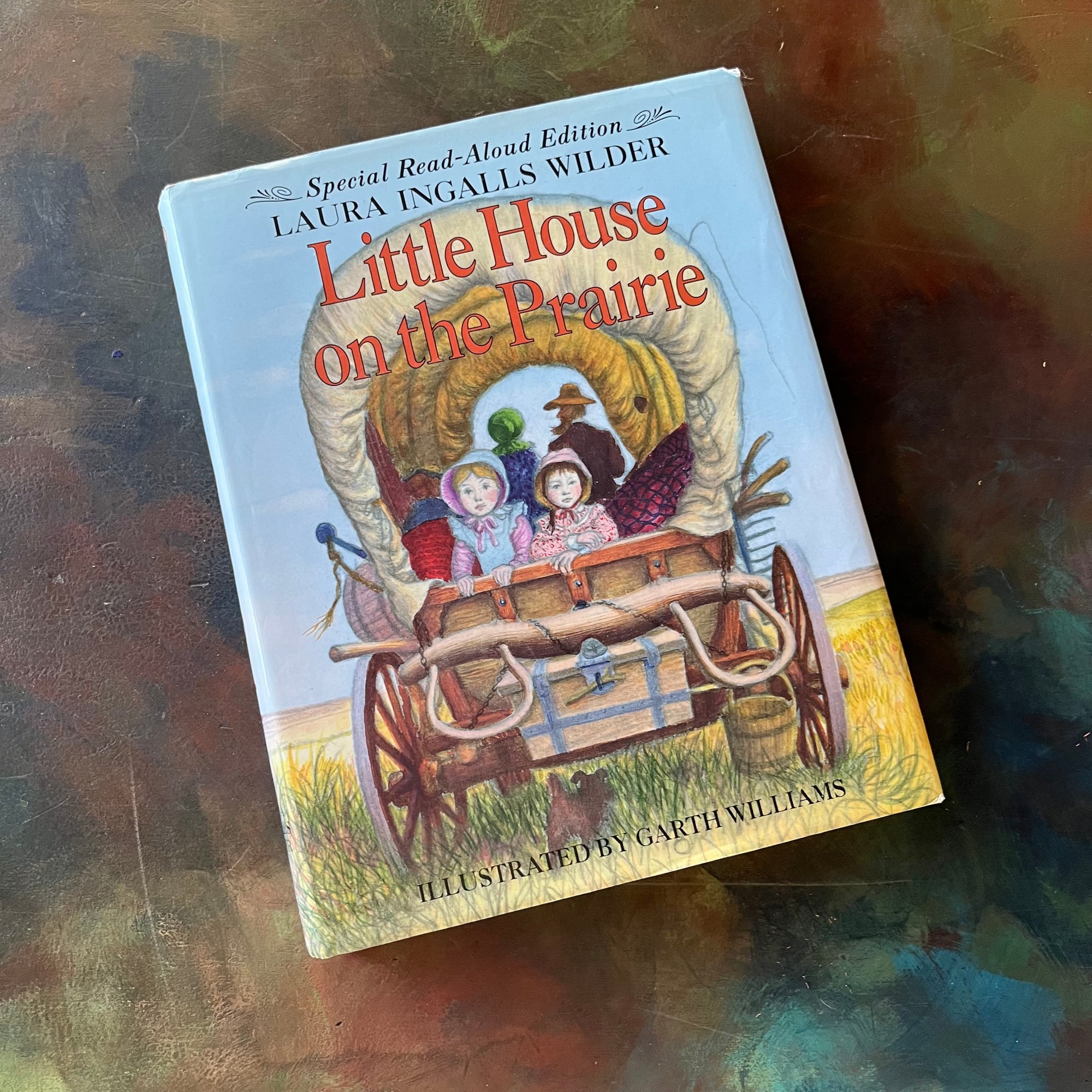 Special Read-Aloud Edition of Little House on the Prairie written by Laura Ingalls Wilder with illustrations by Garth Williams-Newbery Honor Book-vintage children's chapter book-living book-view of the dust jacket's front cover