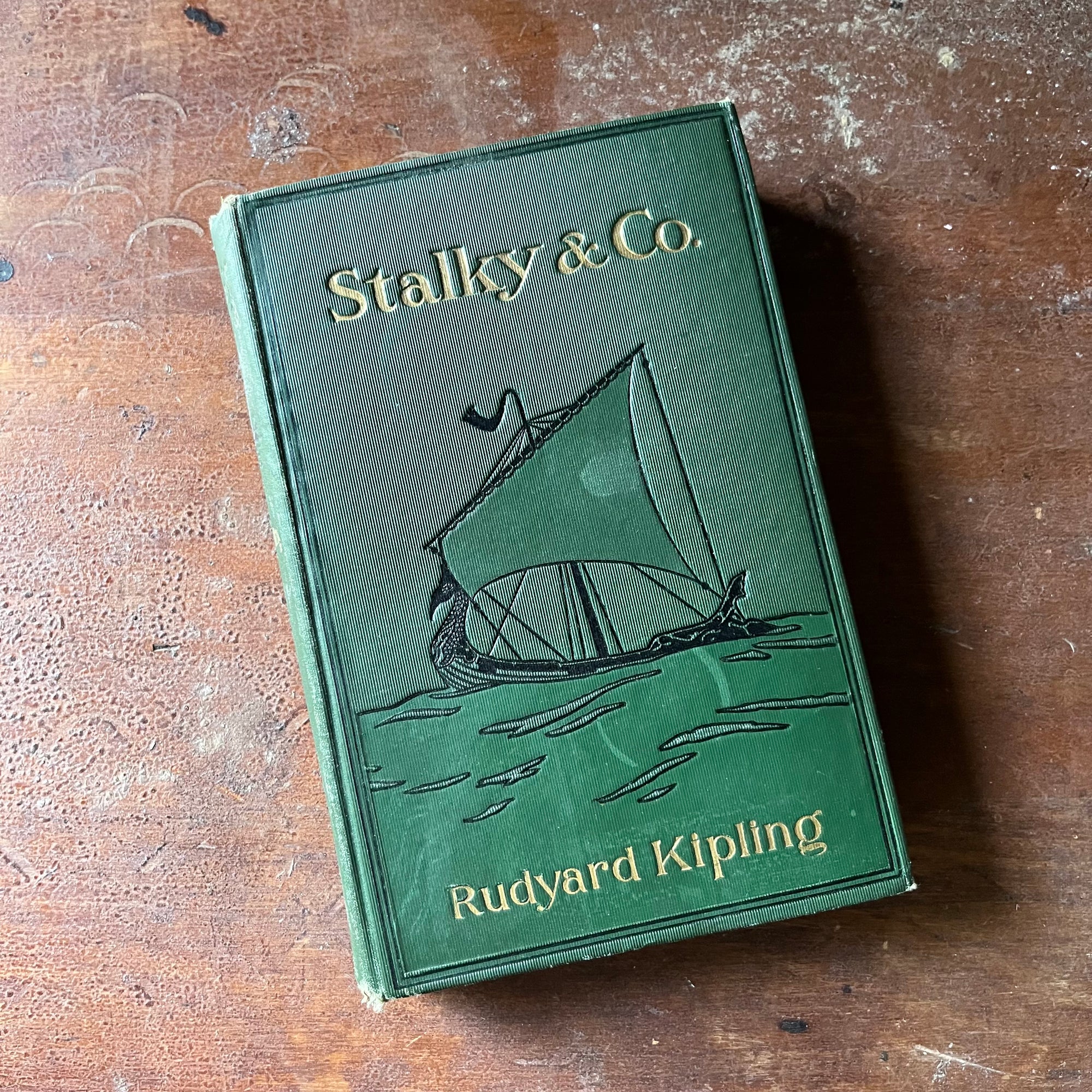 vintage children's chapter book, antique book - Stalky & Co. written by Rudyard Kipling 1899 Edition - view of the embossed front cover