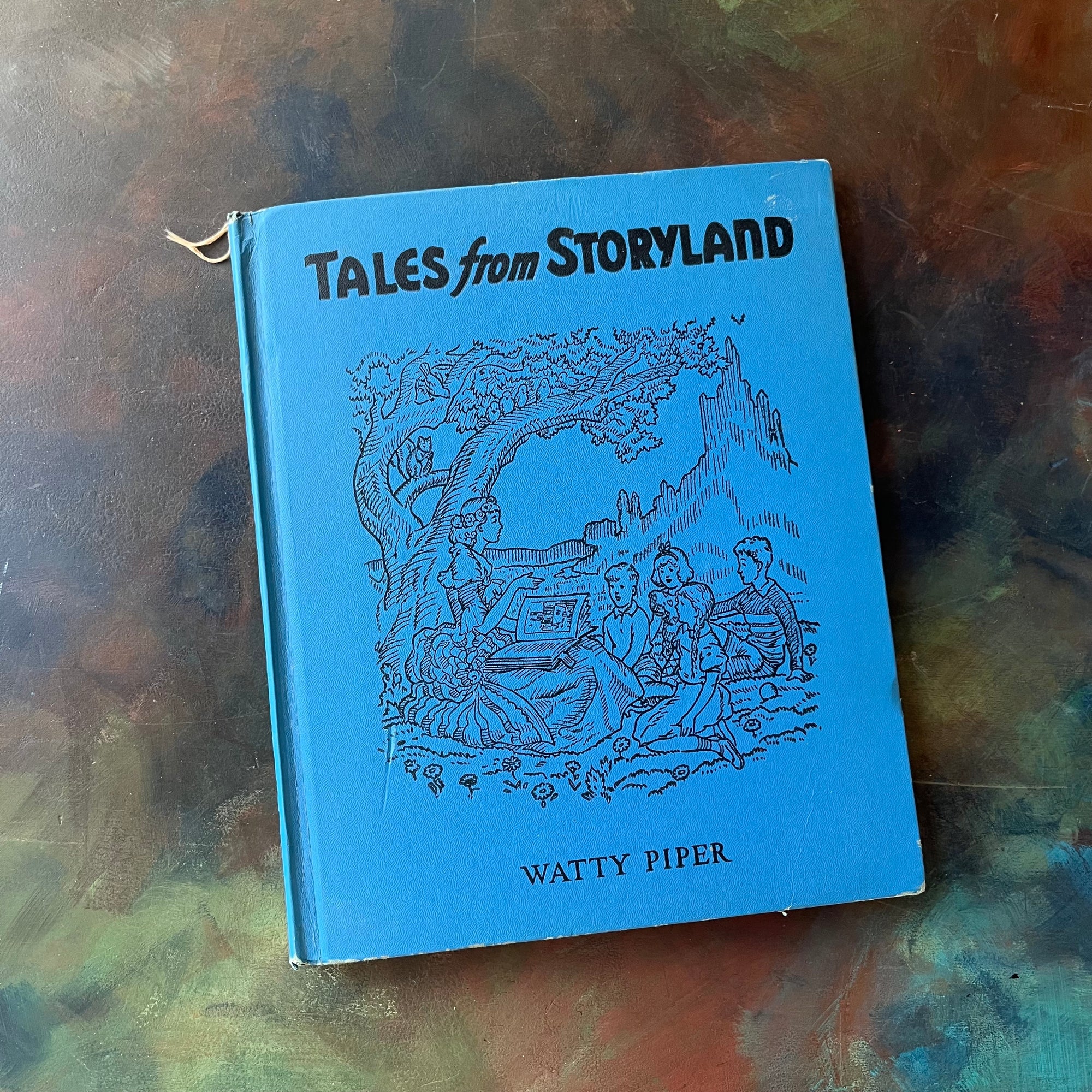 Tales from Storyland Edited by Watty Piper with illustrations by George & Doris Hauman-folktales for children-classic folk tales from around the world-vintage stories for children-view of the embossed front cover
