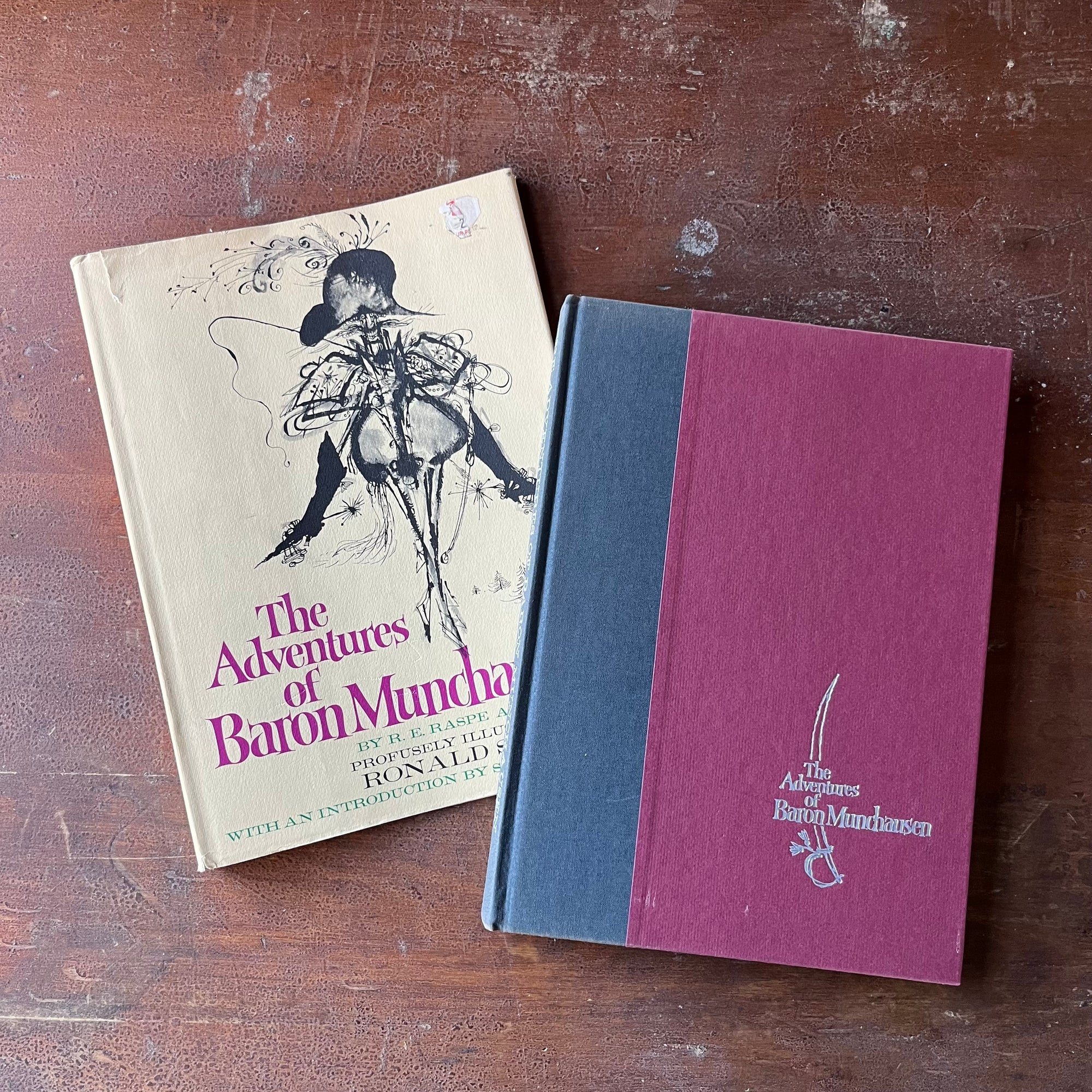 The Adventures of Baron Munchausen by R. E. Raspe with illustrations by Ronald Searle-1969 Edition-Vintage Fantasy--view of the embossed front cover with dust jacket