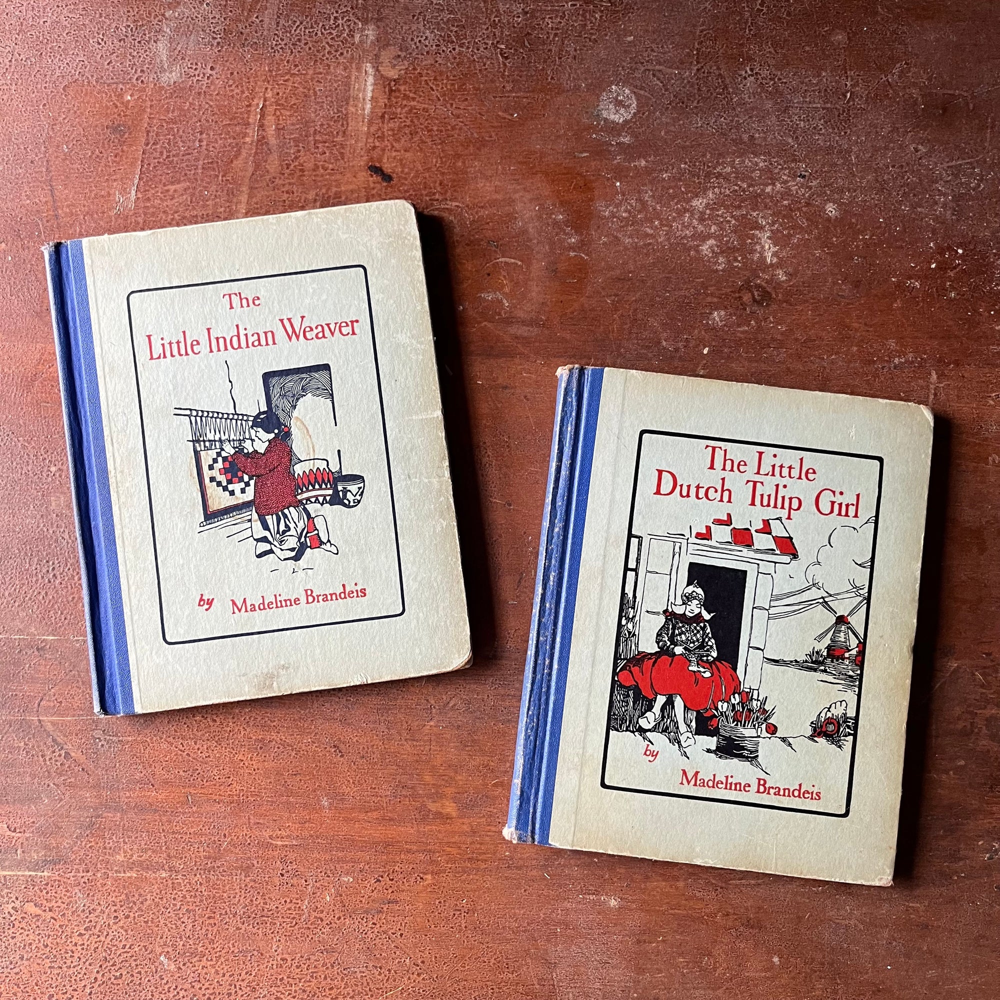 vintage non-fiction for children - The Children of All Lands Stories-The Little Indian Weaver & The Little Dutch Girl written by Madeline Brandeis - view of the front covers with illustrations in black & red