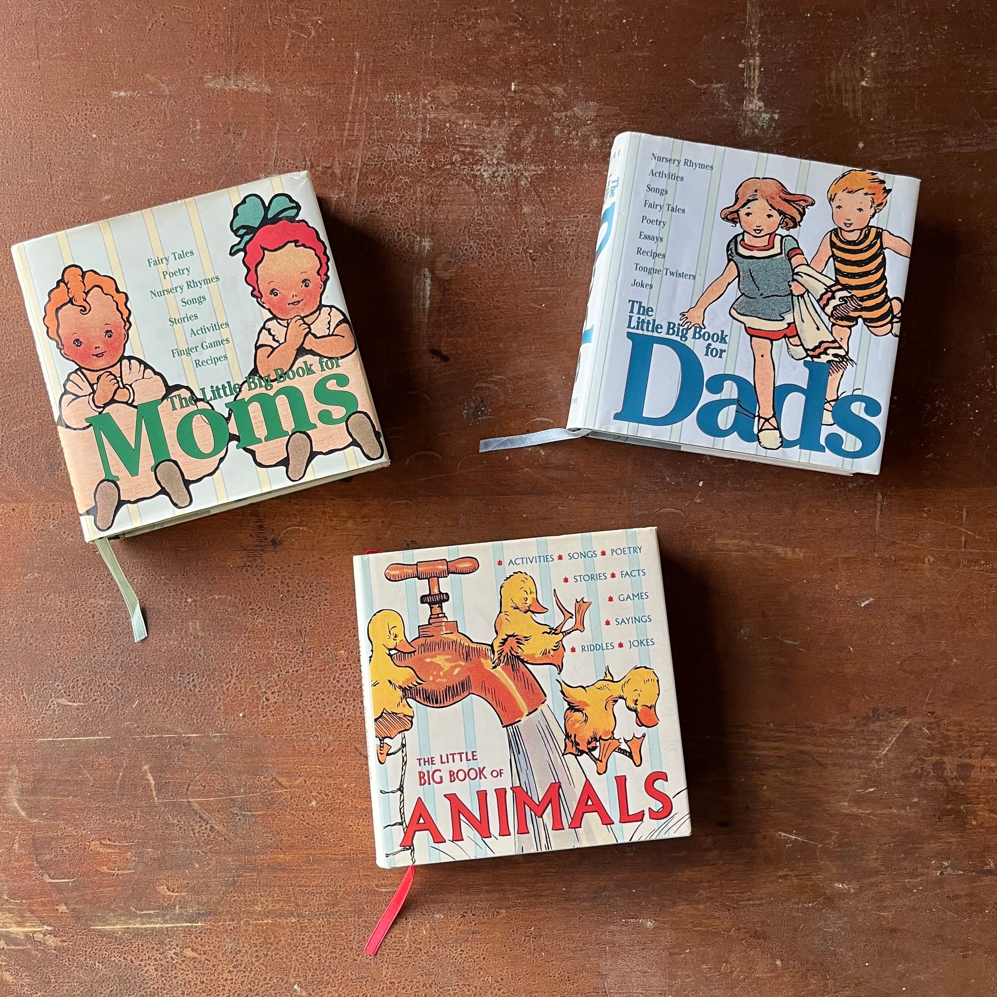 The Little Big Book of Moms, Dads, Animals-Welcome Books-First Edition Gift Books-view of the dust jacket's front covers with illustrations & book titles