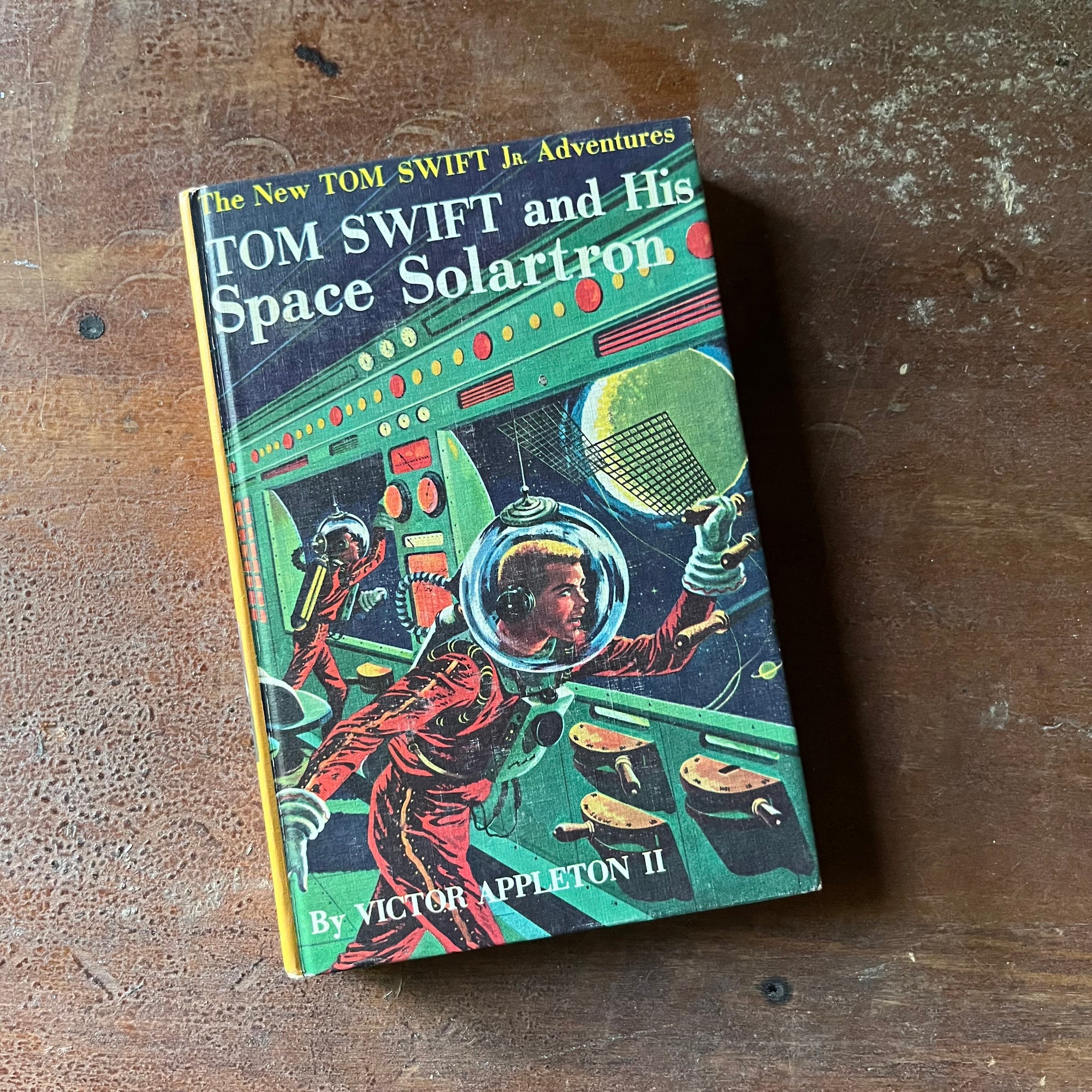 vintage children's chapter book, vintage adventure book, The New Tom Swift Jr. Adventures Book - Tom Swift & This Space Solartron written by Victor Appleton II with illustrations by Graham Kaye - view of the front cover