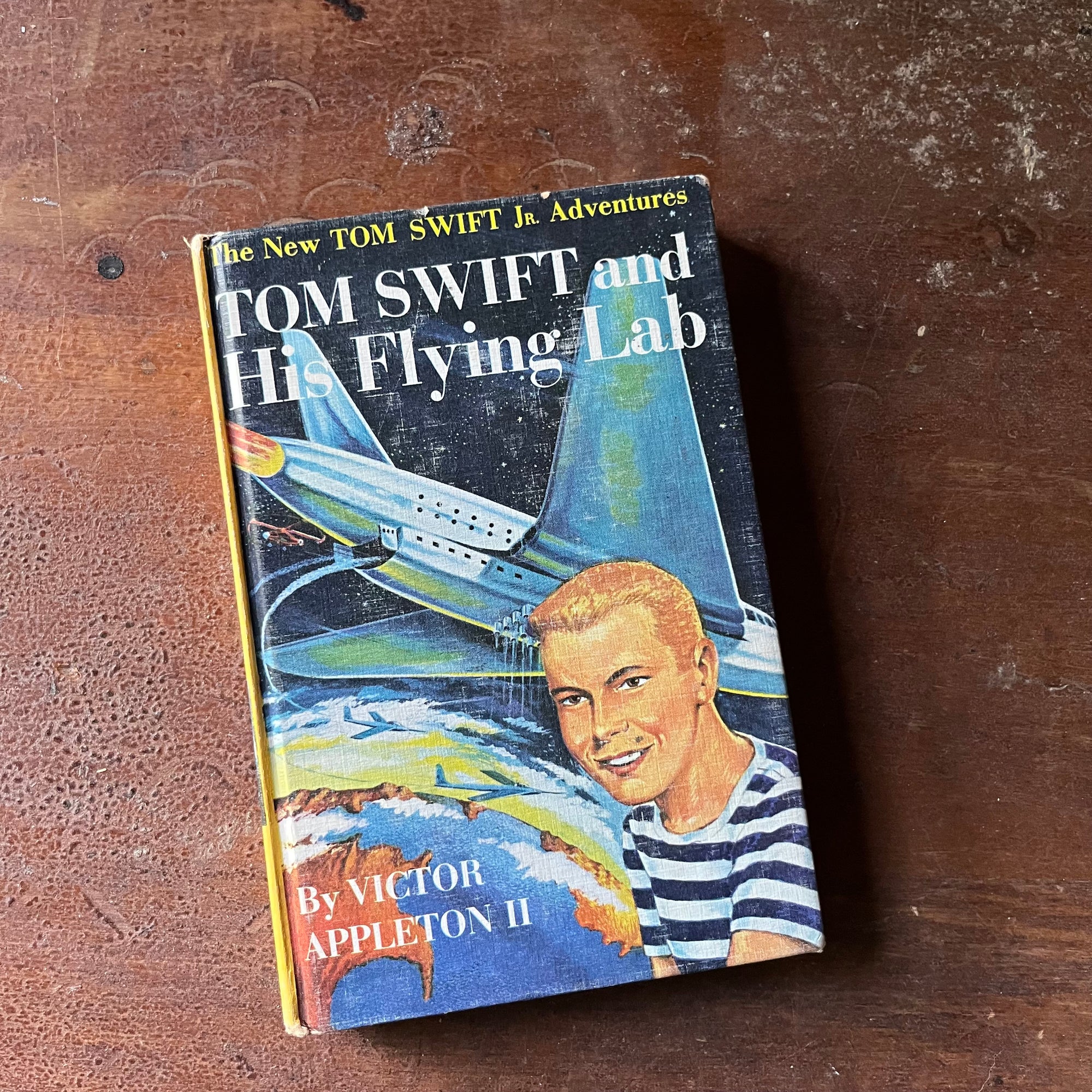vintage children's adventure story, The New Tom Swift Jr. Adventures Book - Tom Swift and His Flying Lab written by Victor Appleton II with illustrations by Graham Kaye - view of the front cover