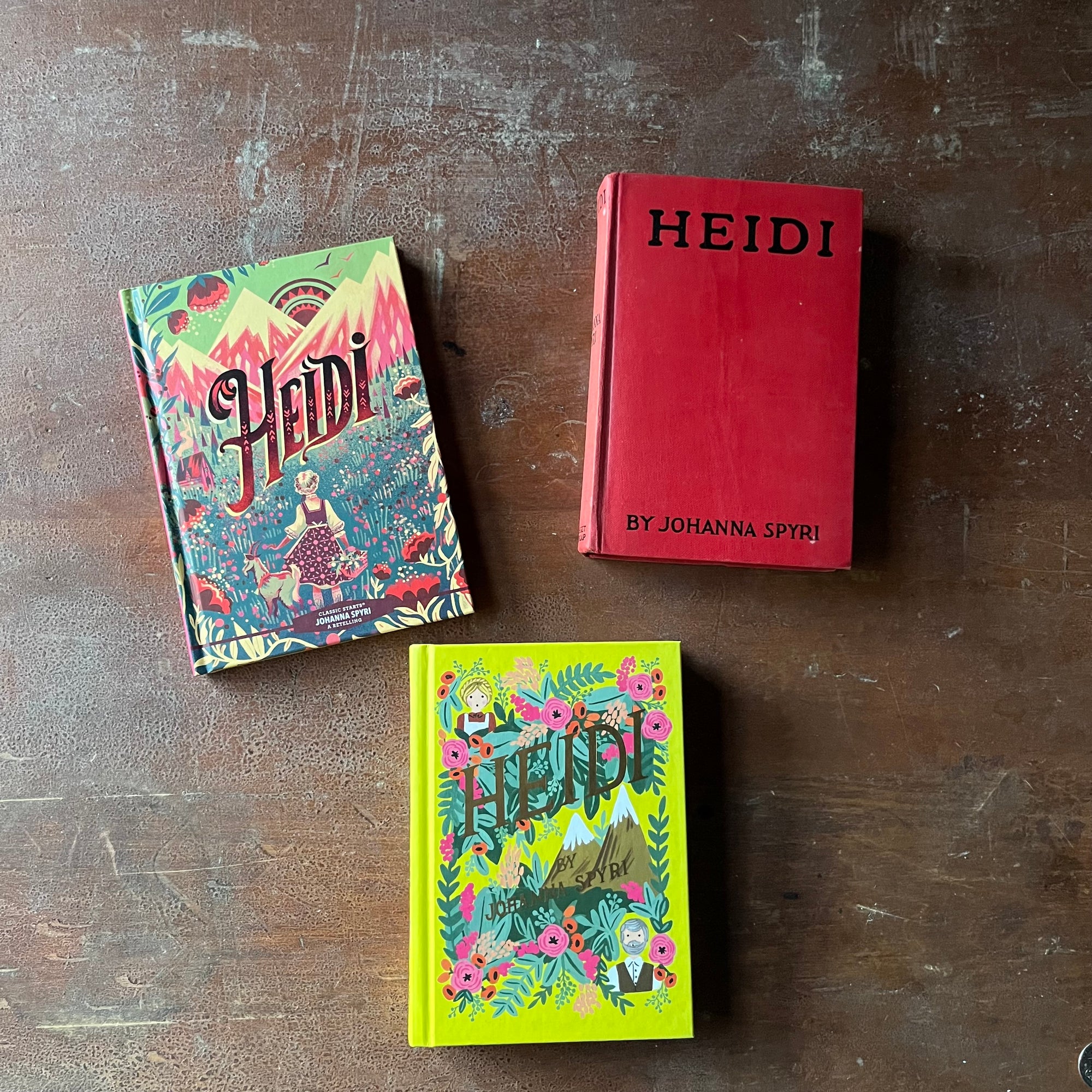 Trio of Heidi Hardcover Editions by Johanna Spyri-Puffin in Bloom, Grosset & Dunlap & Union Square Kids Editions-vintage children's chapter books-view of the front covers