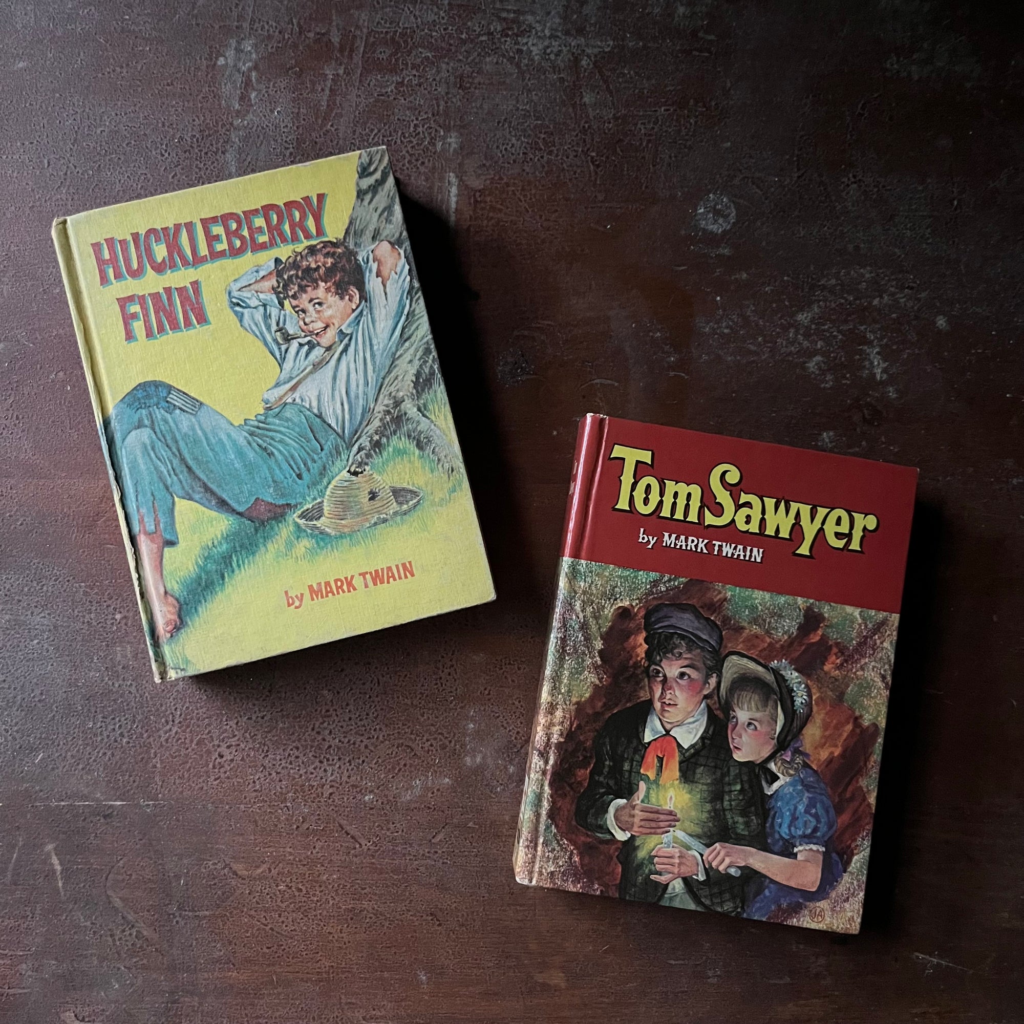 vintage children's chapter books, banned books - Whitman Classics Huckleyberry Finn & Tom Sawyer written by Mark Twain with illustrations by Cart & Paul Frame - view of the front covers