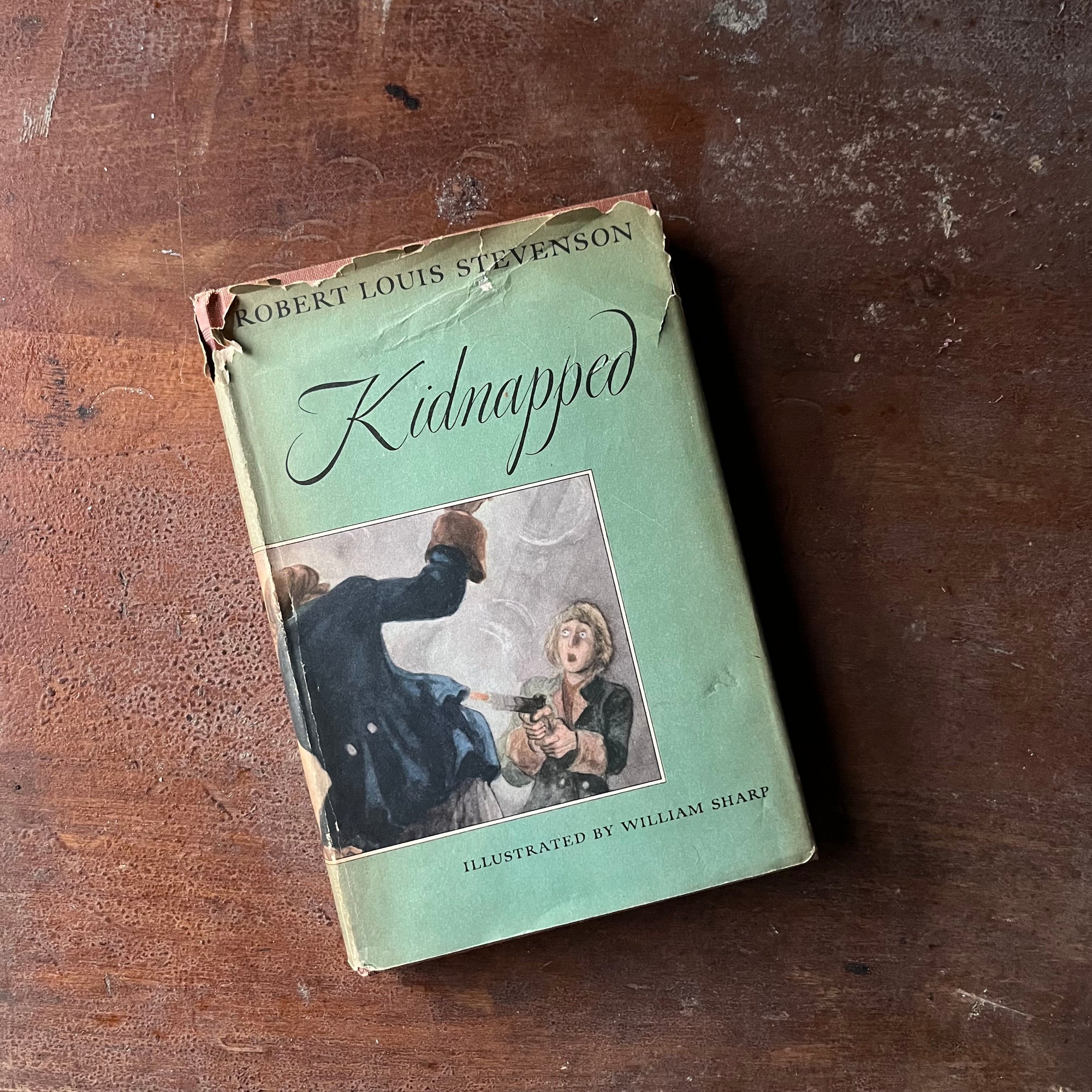 Log Cabin Vintage – vintage children’s book, children’s book, chapter book – Kidnapped by Robert Louis Stevenson with illustrations by William Sharp - a 1949 Edition - view of the dust jacket's front cover