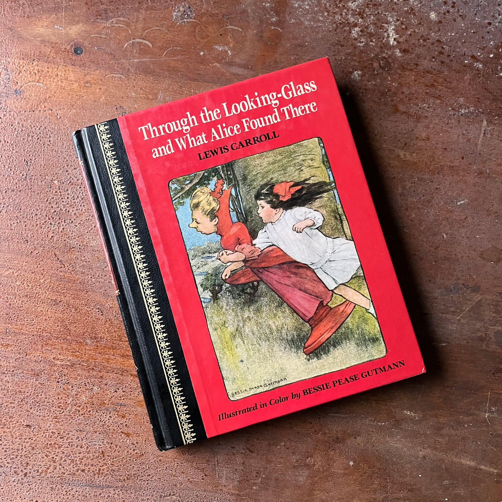 Log Cabin Vintage – vintage children’s book, children’s book, chapter book, Children's Classics Edition - Through the Looking Glass and What Alice Saw There by Lewis Carroll with color illustrations by Bessie Pease Gutmann and drawings by John Tenniel - view of the front cover