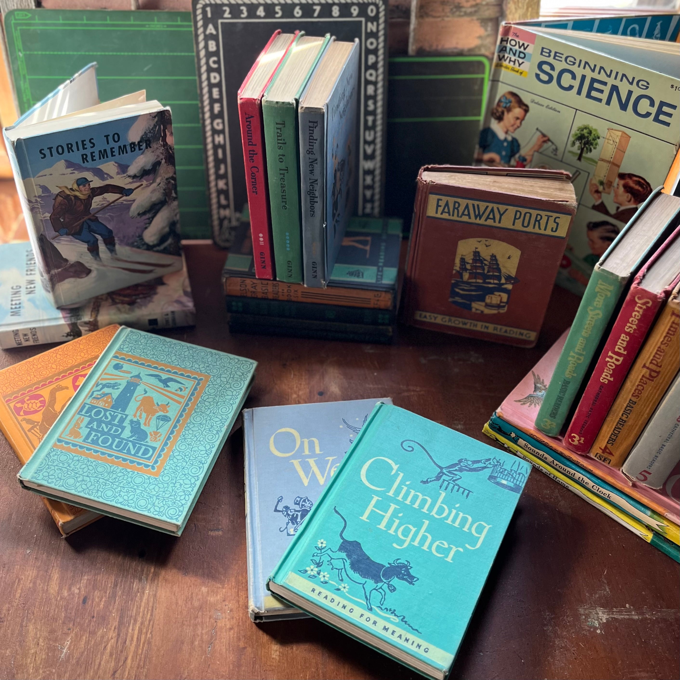 a collage of vintage schoolbooks by different publishers
