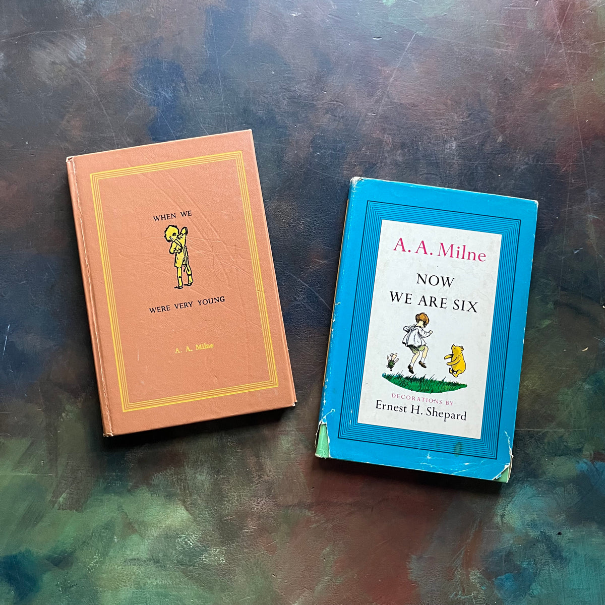 A. A. Milne-When We Were Very Young-Now We Are Six-Illustrations by E. H. Shepard-vintage children's short stories-children's poetry-view of the front covers showing the dust jacket cover of Now We are Six
