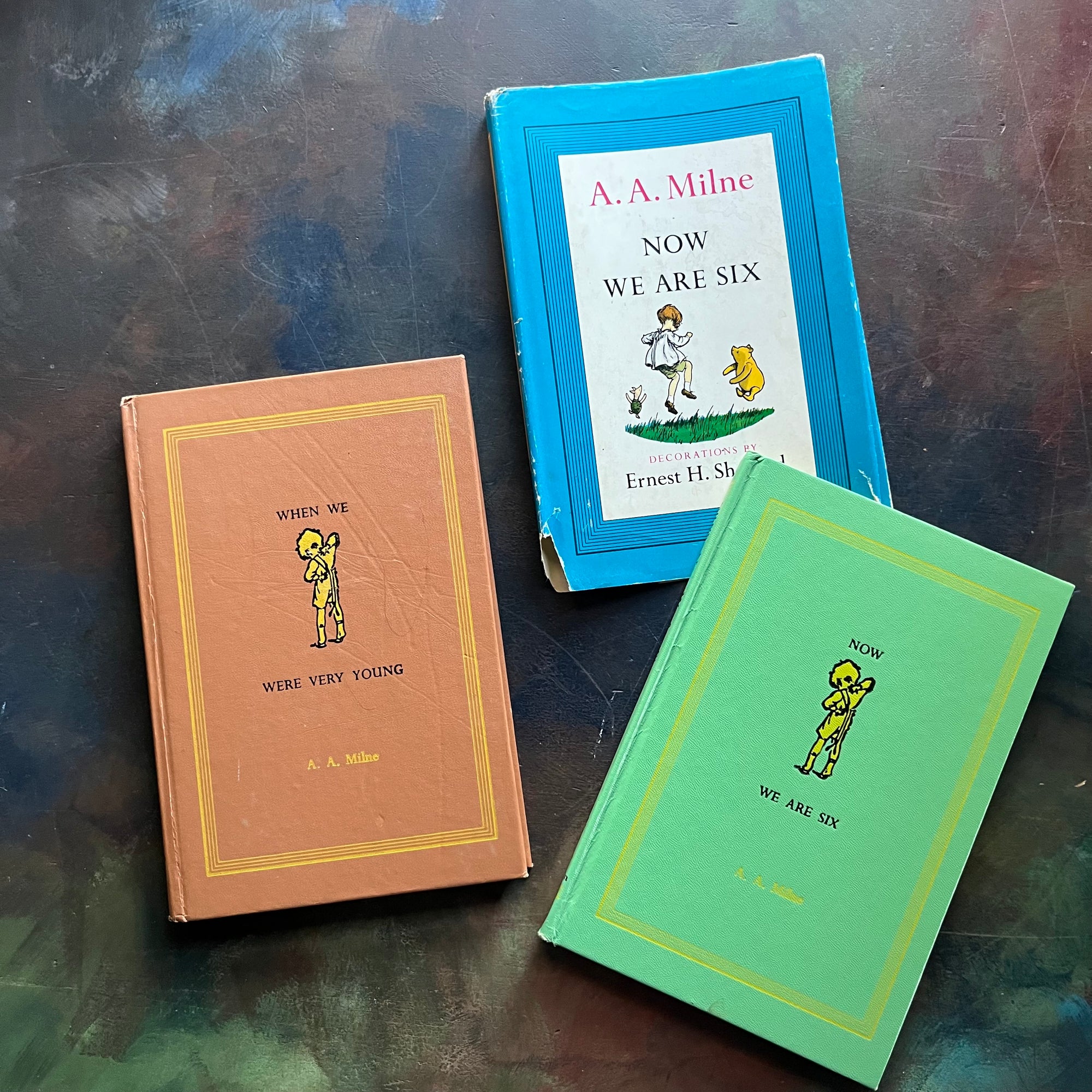 A. A. Milne-When We Were Very Young-Now We Are Six-Illustrations by E. H. Shepard-vintage children's short stories-children's poetry-view of the front covers depicting a little boy (Christopher Robin) getting dressed