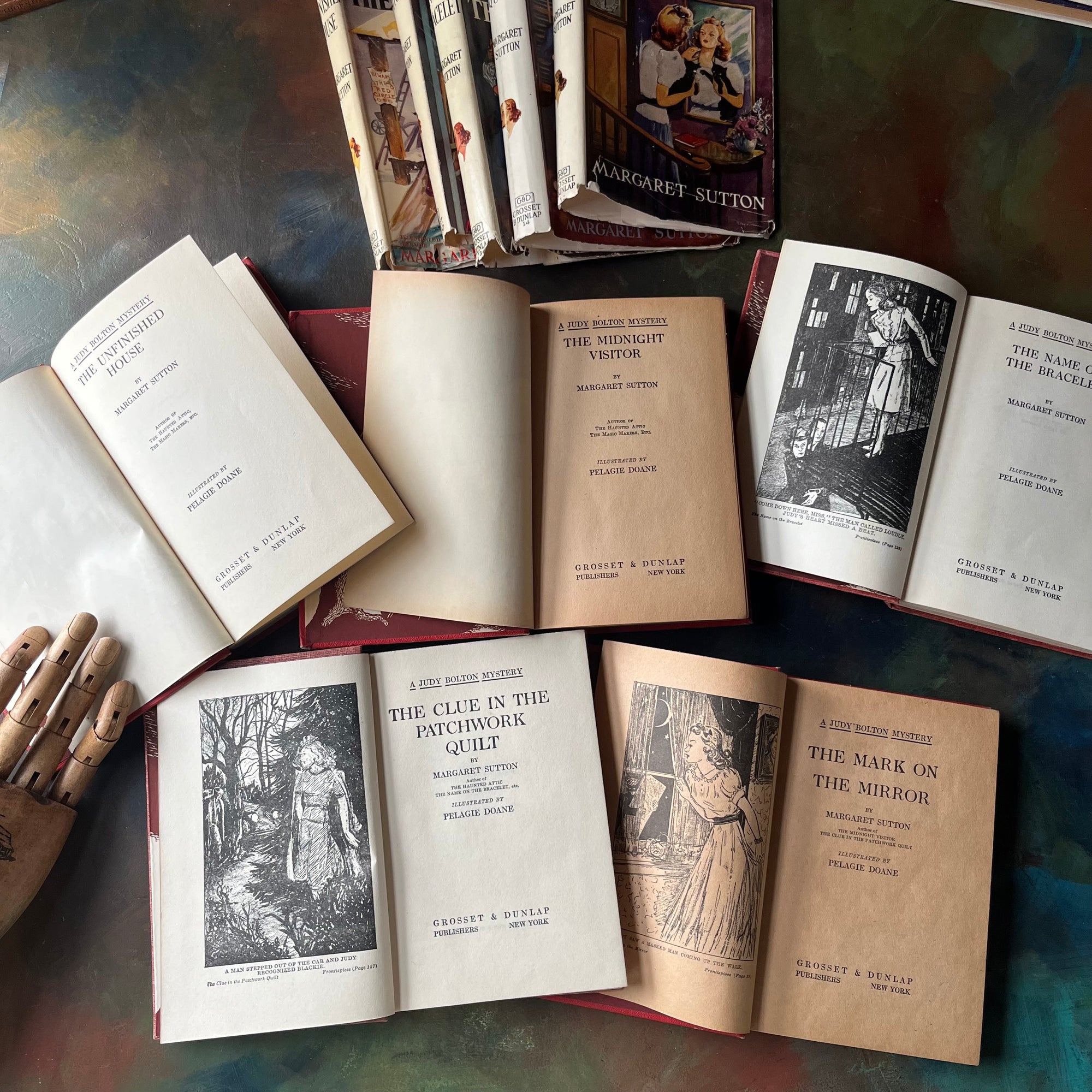 A Judy Bolton Mystery Book Set by Margaret Sutton Volumes 11 through 15-vintage children's mystery books-mystery books for girls-view of the title pages & frontispieces