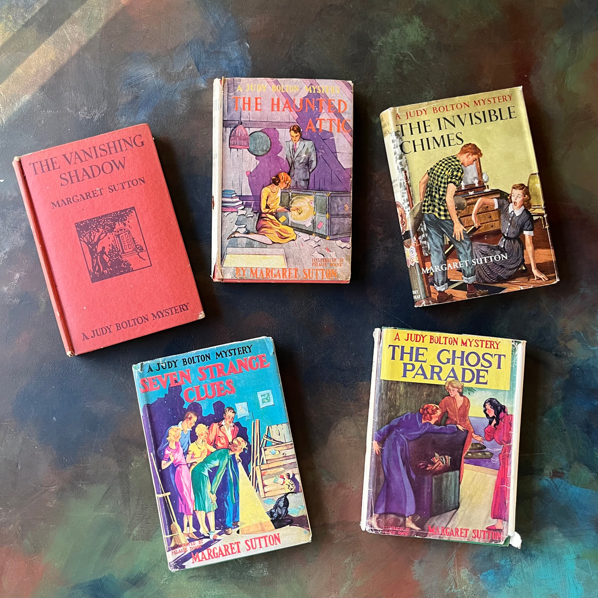 A Judy Bolton Mystery Book Set written by Margaret Sutton with illustrations by Pelagie Doane-Volumes 1 through 5-antique mystery books for girls-children's mystery books-view of the front covers with dust jackets