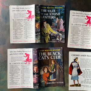 A Judy Bolton Mystery Book Set written by Margaret Sutton with illustrations by Pelangie Doane - Volumes 21 through 24-vintage mystery books for girls-vintage children's mysteries-view of the outside of the dust jackets