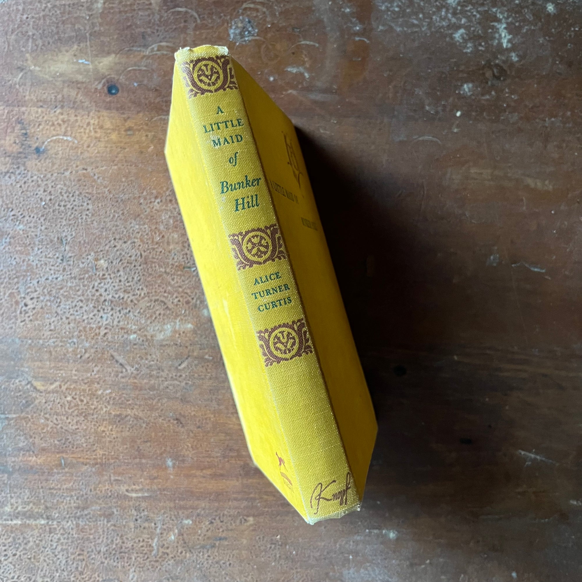 vintage children's living history book, vintage children's chapter book - A Little Maid of Bunker Hill written by Alice Turner Curtis with illustrations by Sandra James:  Published in 1952 by Alfred A. Knopf - view of the spine