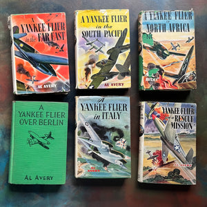A Set of Six Yankee Flier Books by Al Avery-Air Combat Stories for Boys-antique warplane books-view of the front covers with dust jackets depicting different planes