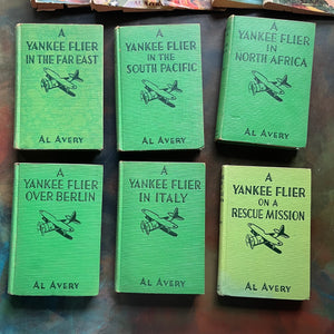 A Set of Six Yankee Flier Books by Al Avery-Air Combat Stories for Boys-antique warplane books-closeup view of the covers with the same plane design on each one