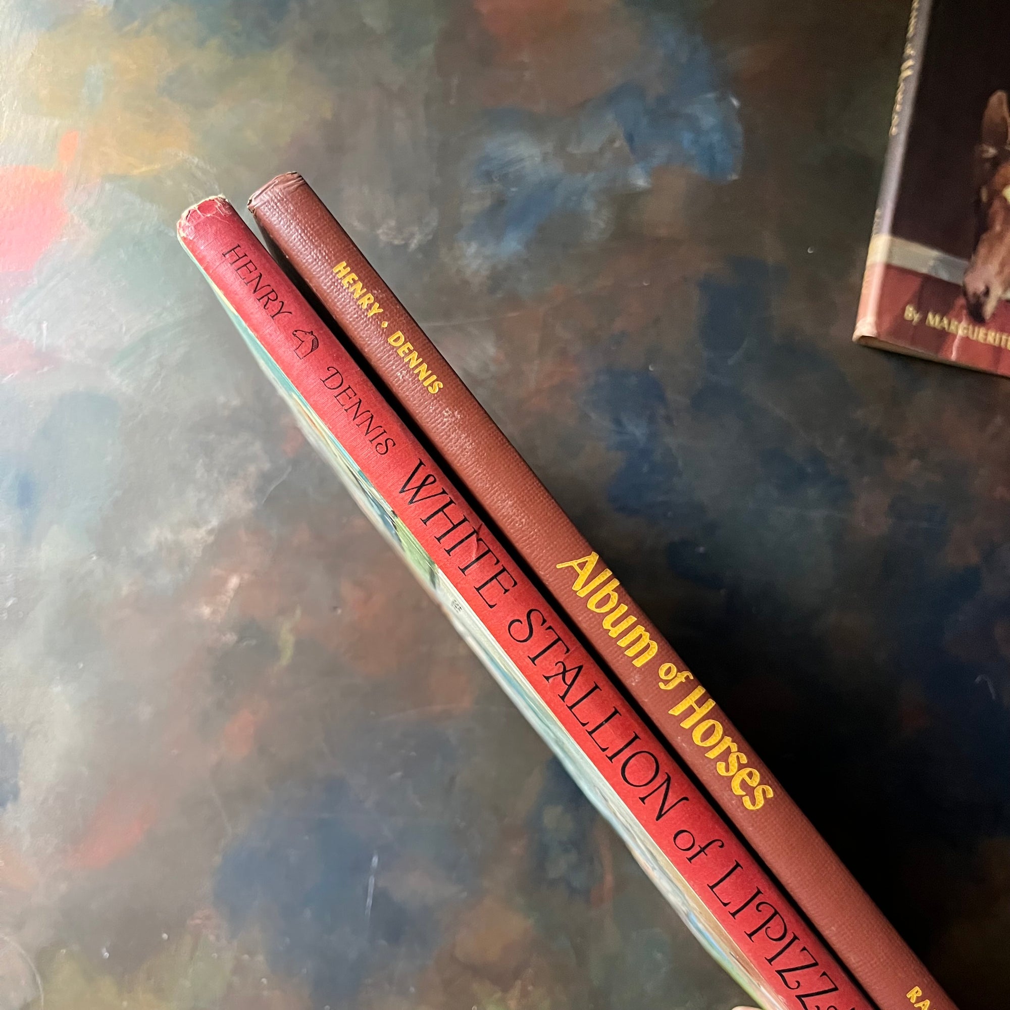 Album of Horses and White Stallion of Lipizza by Marguerite Henry-illustrated by Wesley Dennis-vintage horse books for kids-view of the spines