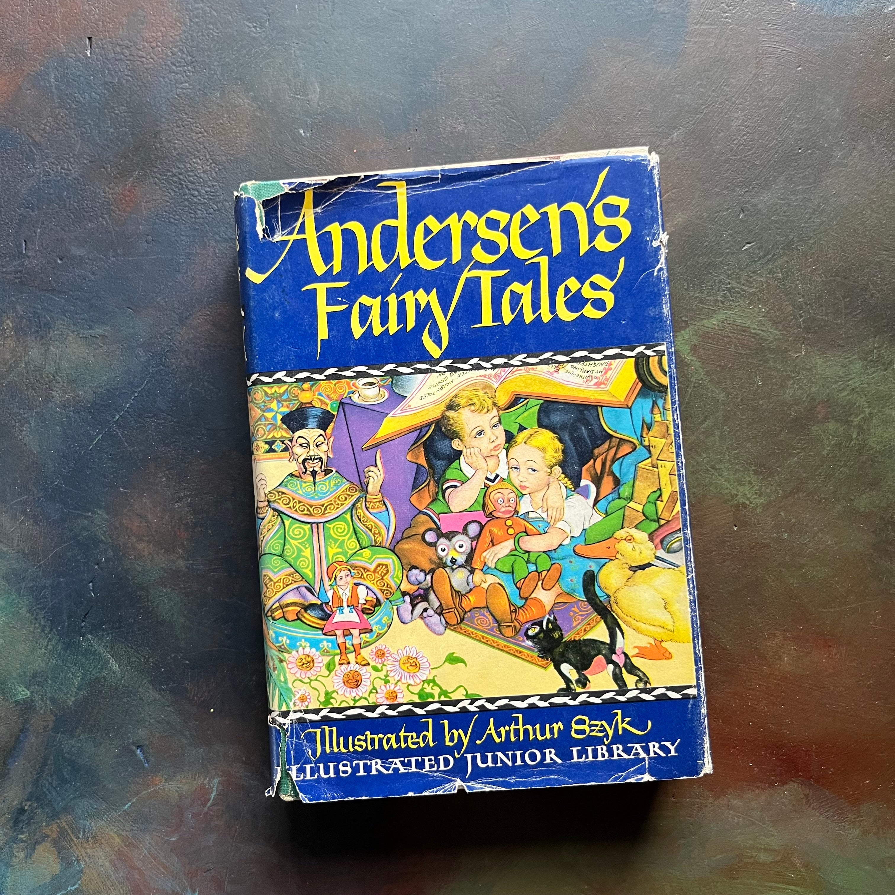 Andersen's Fairy Tales-vintage children's fairy tales & classics-Illustrated Junior Deluxe Editions-view of the dust jacket's front cover with a colorful illustration of images from the stories within the pages
