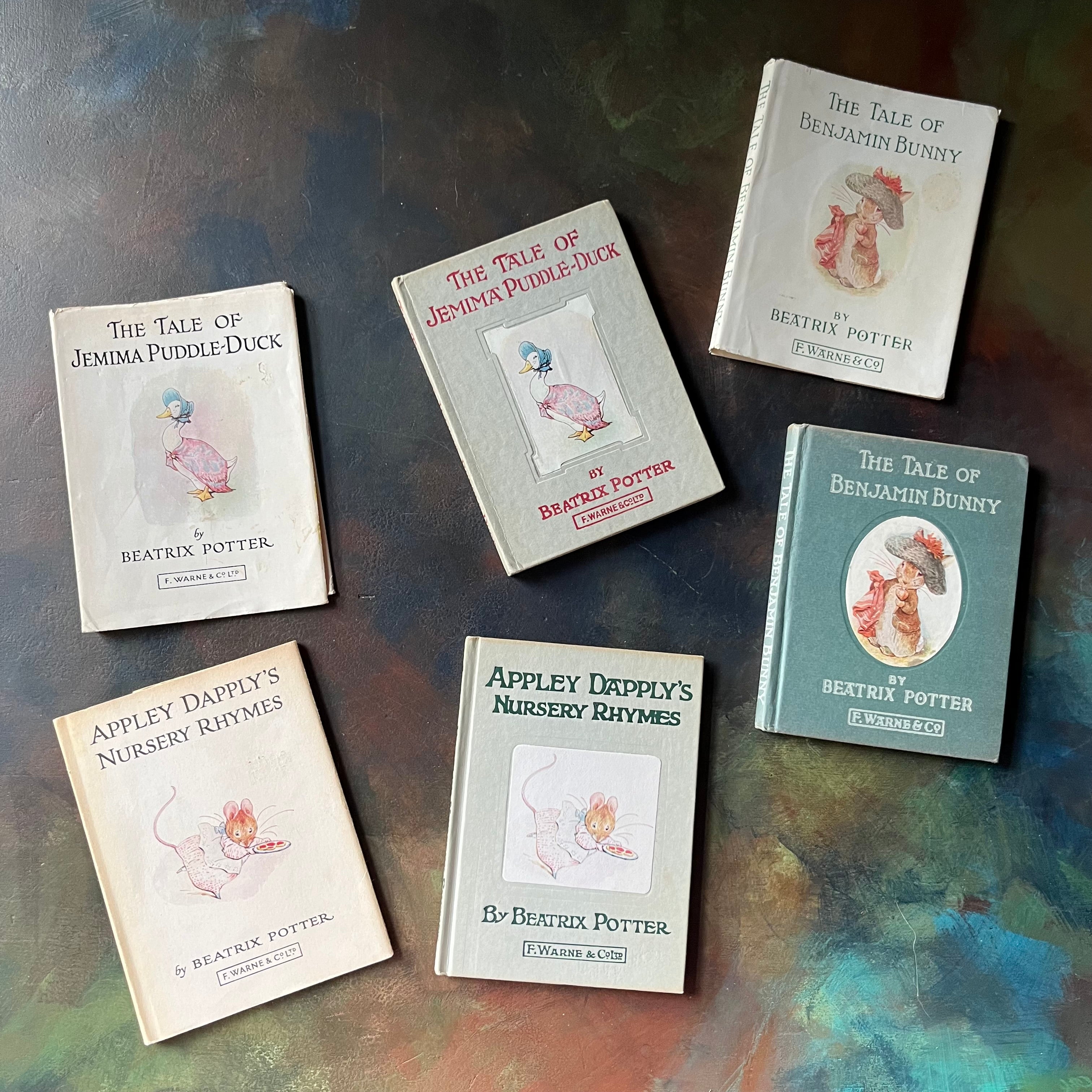 Beatrix Potter Book Set-A Tale of Benjamin Bunny-Appley Dapply's Nursery Rhymes-The Tale of Jemima Puddle Duck-vintage children's storybooks-view of the front covers with dust jacket's displayed next to the books