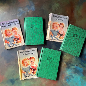 Bobbsey Twins Mysteries Green Three Book Set with Dust Jackets-Laura Lee Hope-vintage children's chapter books-young reader mysteries-view of the front covers in green & black design