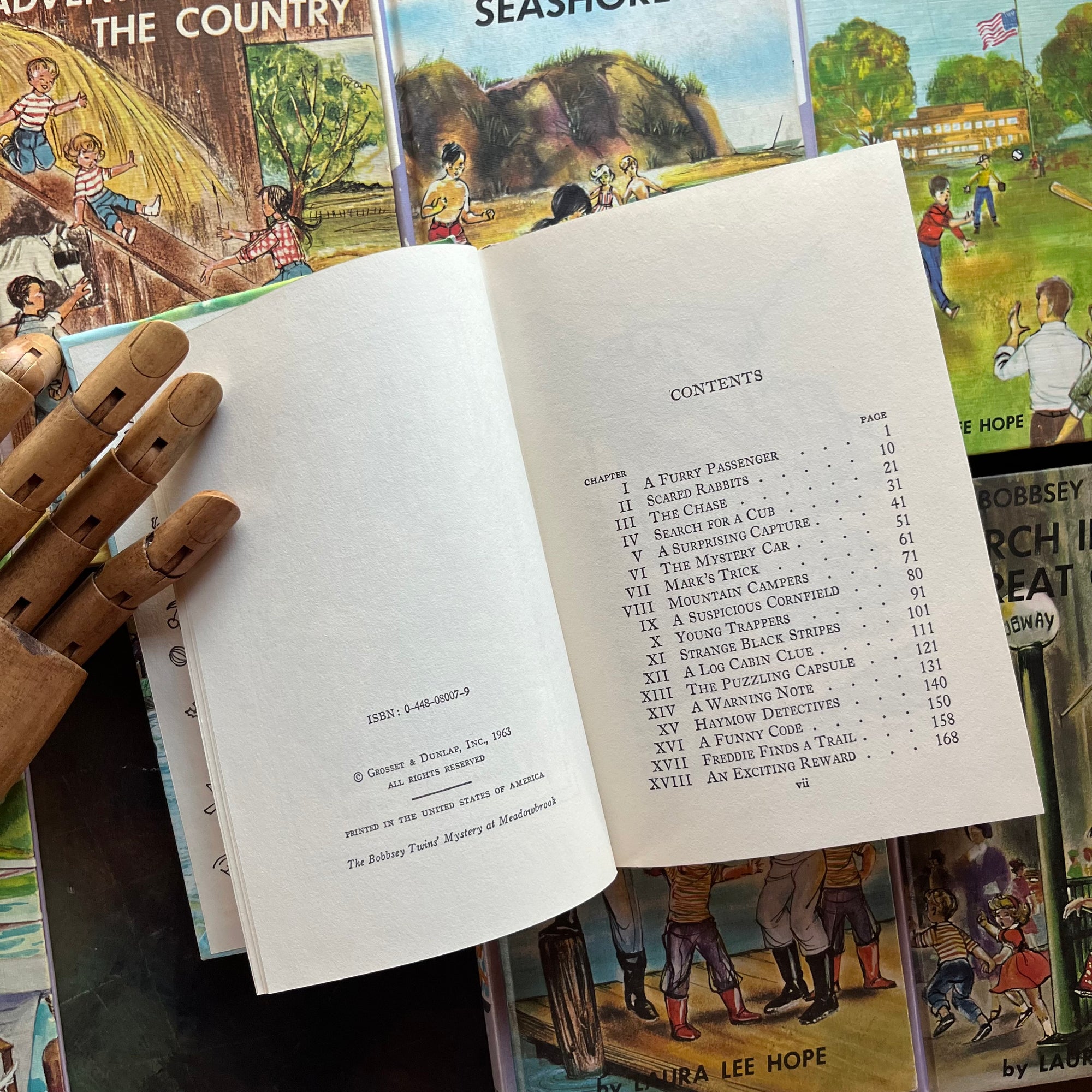 Bobbsey Twins Starter Set–First 10 Books -Vintage 1950s–1960s Purple Cover Editions-children's mysteries-early chapter books-view of the copyright and contents pages