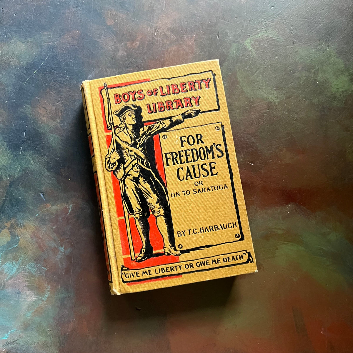 Boys of Liberty Library-For Freedom's Cause or On to Saratoga written by T.C. Harbaugh-Give Me Liberty or Give Me Death-vintage children's chapter book-view of the embossed front cover