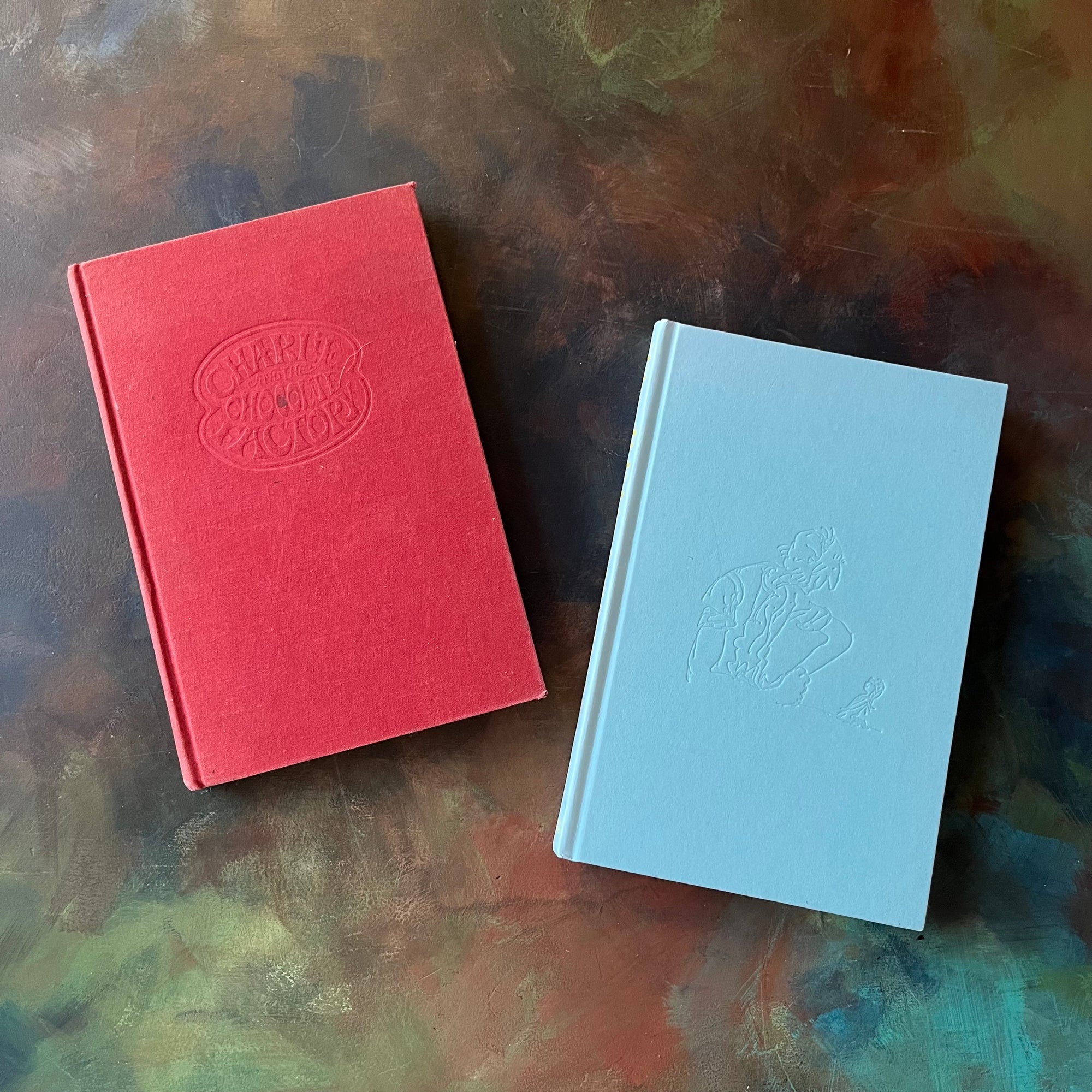 Charlie & The Chocolate Factory and The BFG written by Roald Dahl with illustrations by Joseph Schindelman-First Editions-vintage children's chapter books-classic literature-view of the embossed front covers