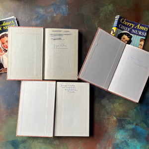Cherry Ames Book Set-Cherry Ames Student Nurse-Cherry Ames Chief Nurse-Cherry Ames Visiting Nurse-vintage children's mystery books-view of the inside covers