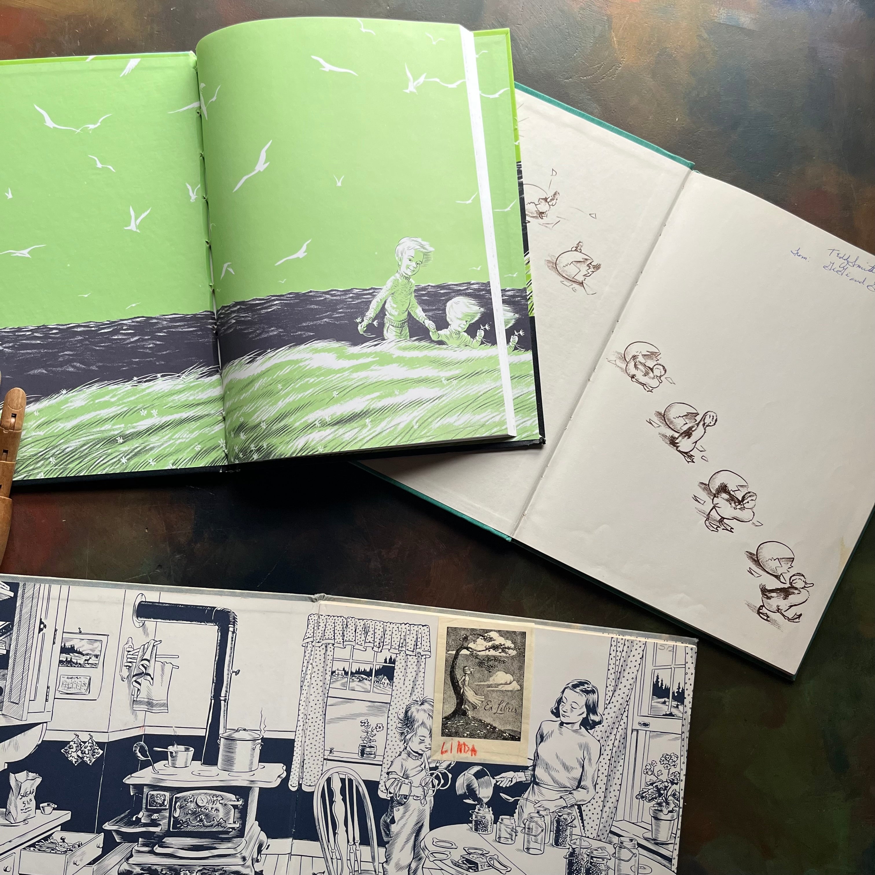 Set of Three iconic children's picture books-One Morning in Maine, Blueberries for Sal, and Make Way for Ducklings-award-winning children's picture book classics written and illustrated by Robert McCloskey-Caldecott Award Winning Books- view of the inside covers