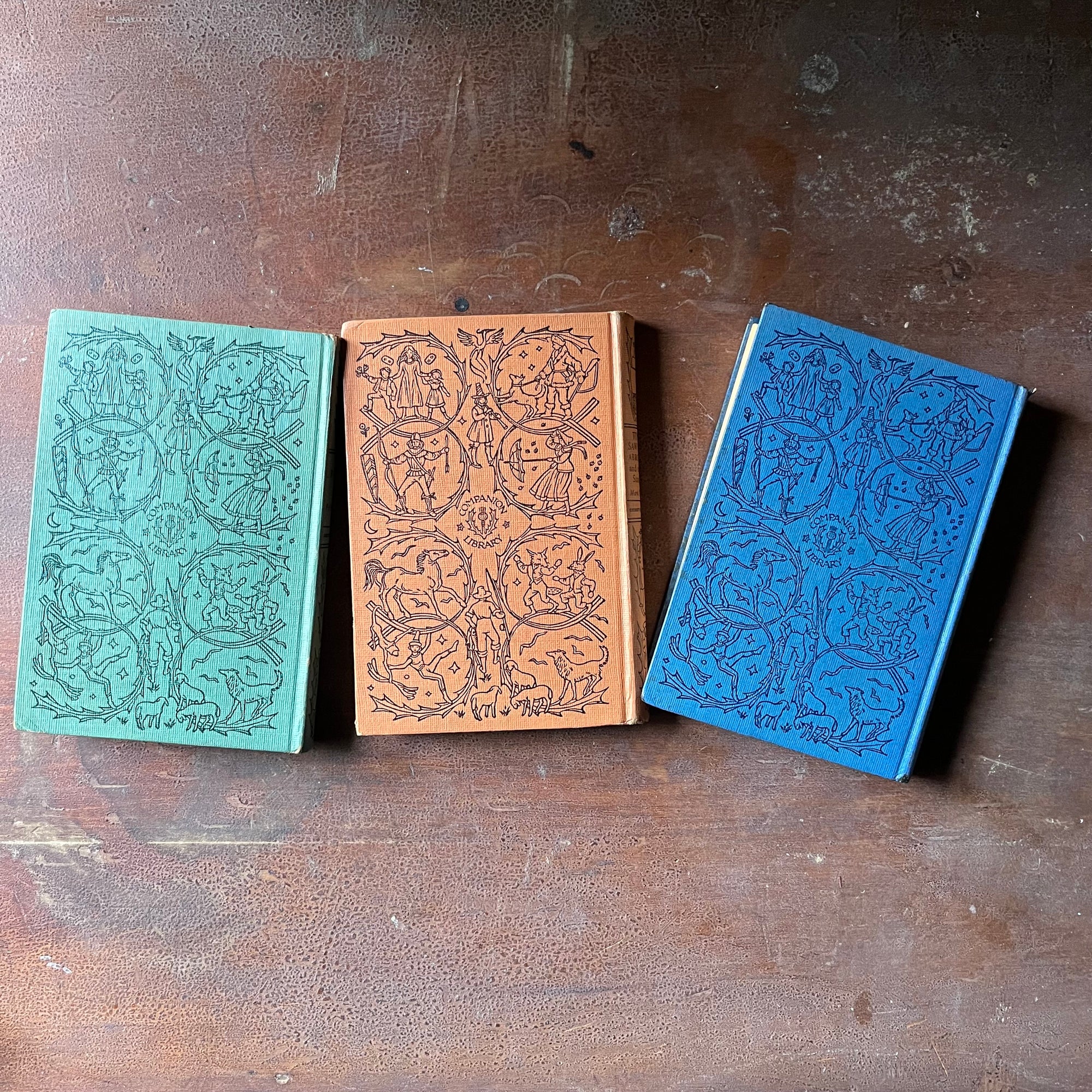 vintage collectible books, vintage children's chapter books - Companion Library Book Set-Alice in Wonderland, Bambi & The Adventures of Tom Sawyer - view of the back covers with a very similar design as the front