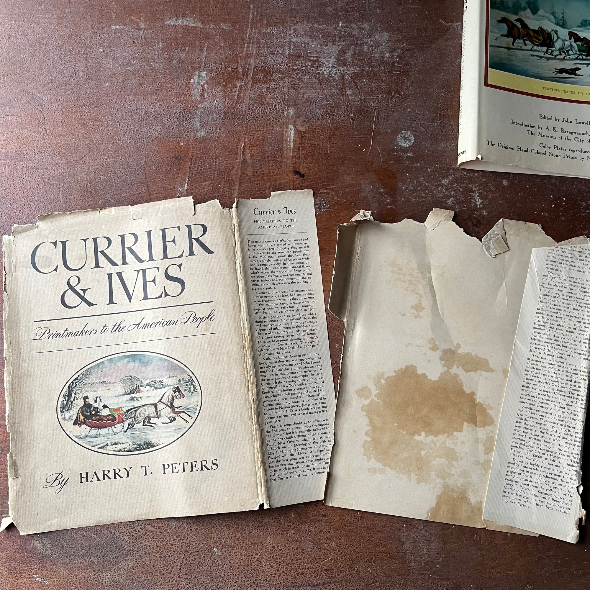 Currier & Ives Bookset-Printmakers to the American People & Chronicles of America-vintage art books-view of the condition of the dust jacket for Printmakers of the American People - it is torn in half & ratty looking