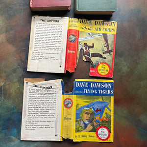 Dave Dawson The War Adventure Books-Dave Dawson with the Flying Tigers-Dave Dawson with the Air Corps-R. Sidney Bowen-antique adventure books for boys-view of the outside of the dust jackets - note their worn and torn condition
